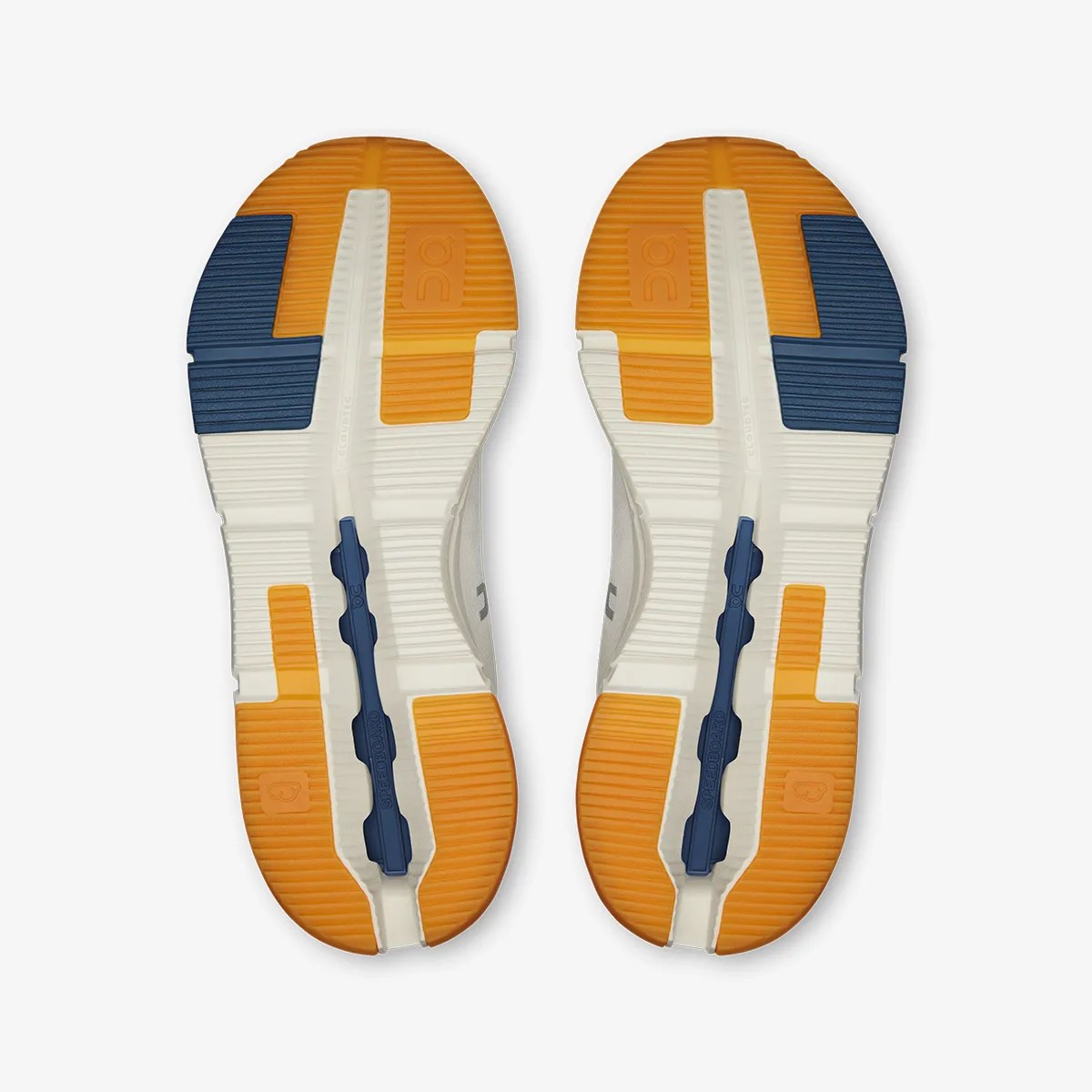 Outsole of a pair of running shoes with orange, navy blue, and white rubber tread and "Speedboard" text on the navy blue section.