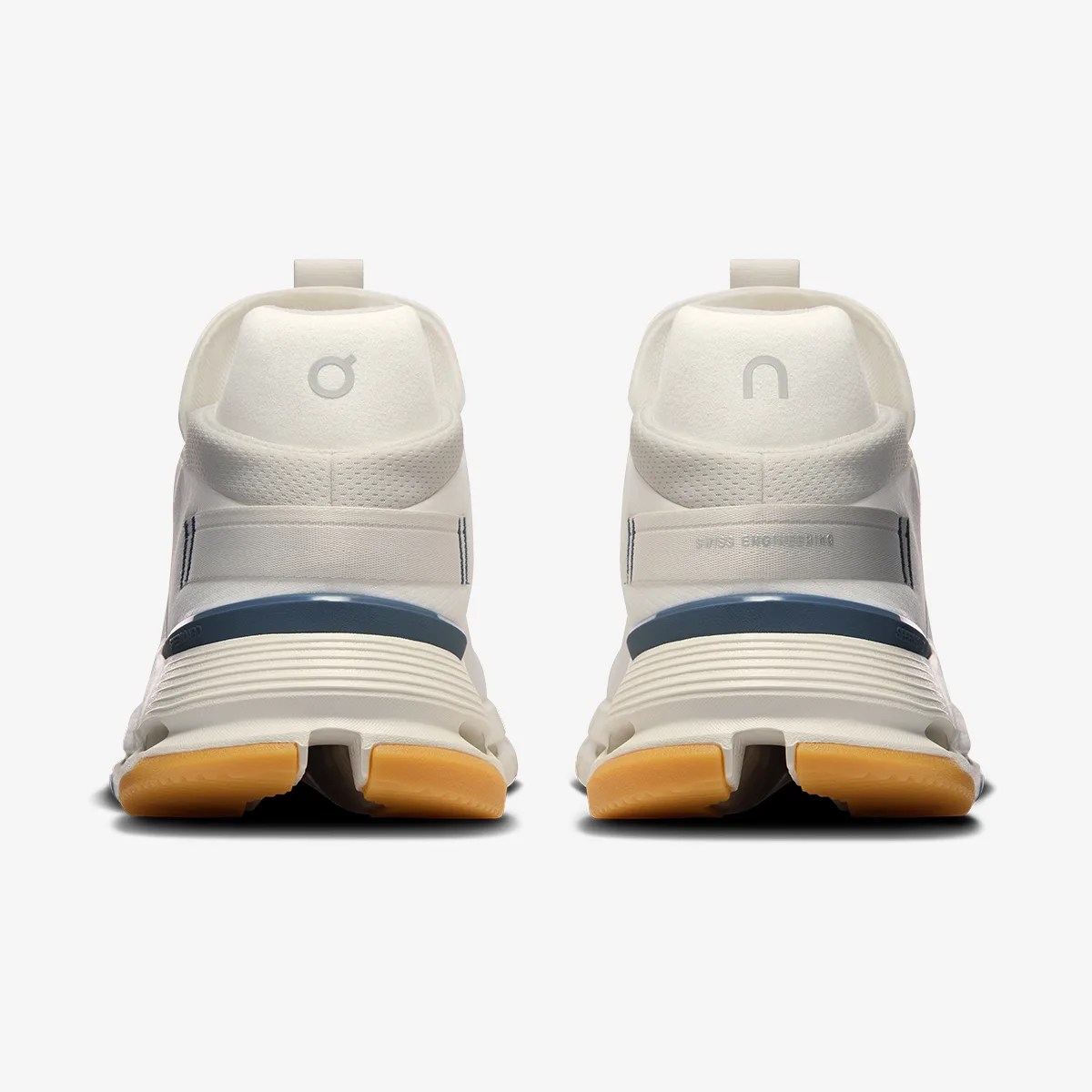 Pair of white athletic shoes with blue accents and gum-colored soles shown from the back.