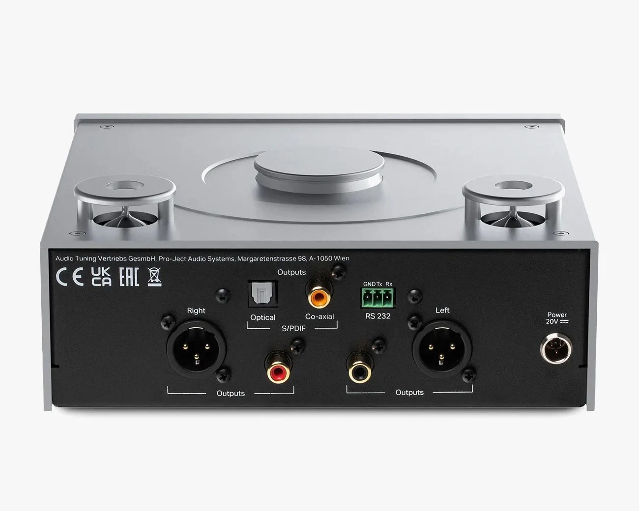 Silver audio device with multiple output ports including XLR, optical, coaxial, and power input on a black panel.