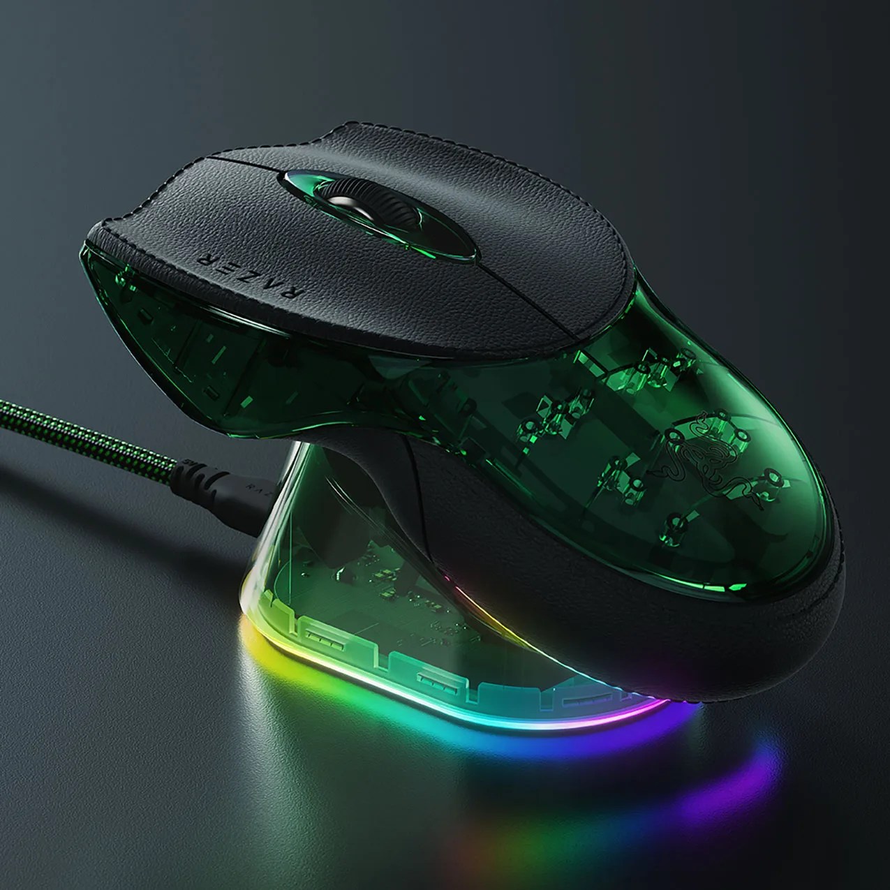 Gaming mouse with black leather top and translucent green body on a glowing RGB-lit charging dock.