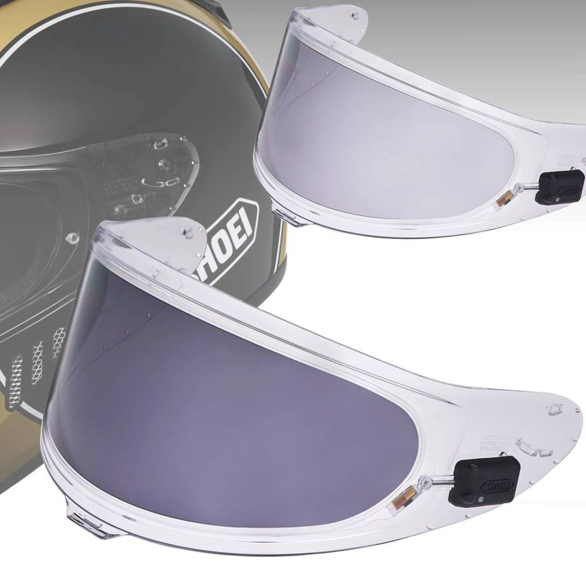 Two clear motorcycle helmet visors with one tinted, shown with a black Shoei helmet in the background.