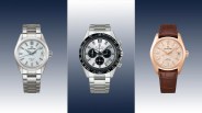 Three Grand Seiko wristwatches: left silver with textured white dial and metal bracelet, center silver chronograph with black bezel and metal bracelet, right rose gold with textured dial and brown leather strap.