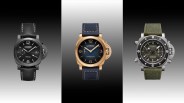 Three Panerai wristwatches: left black with black leather strap, center gold with blue leather strap, right silver with green fabric strap.