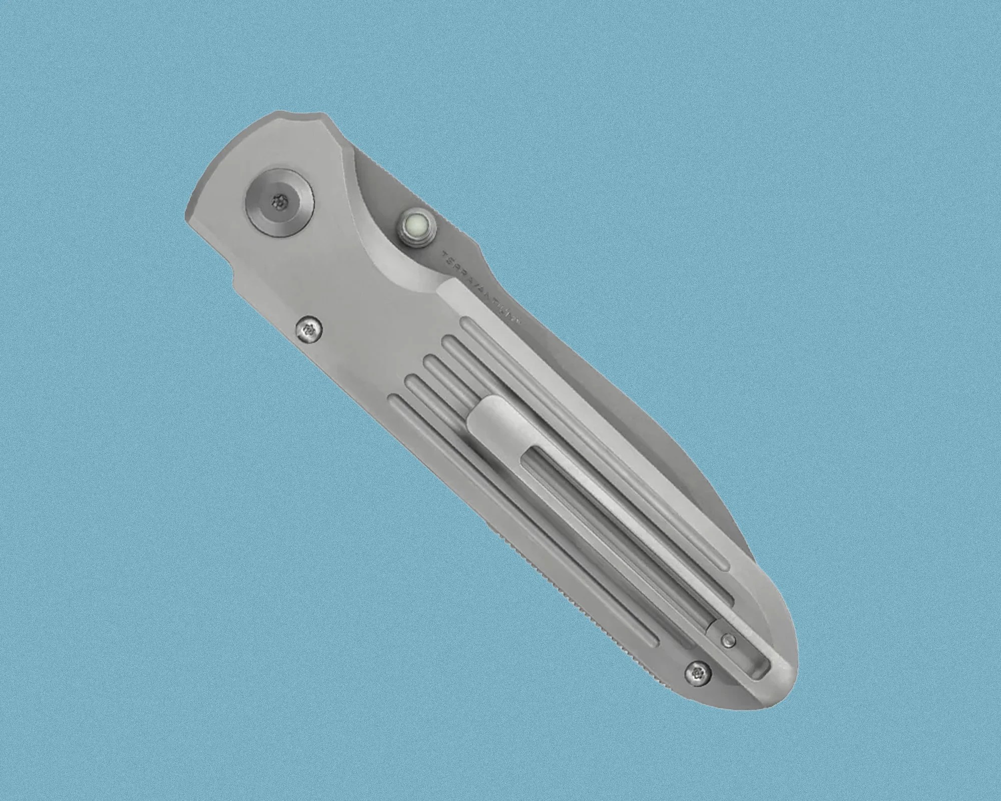 Closed silver folding pocket knife with a clip on a blue background.