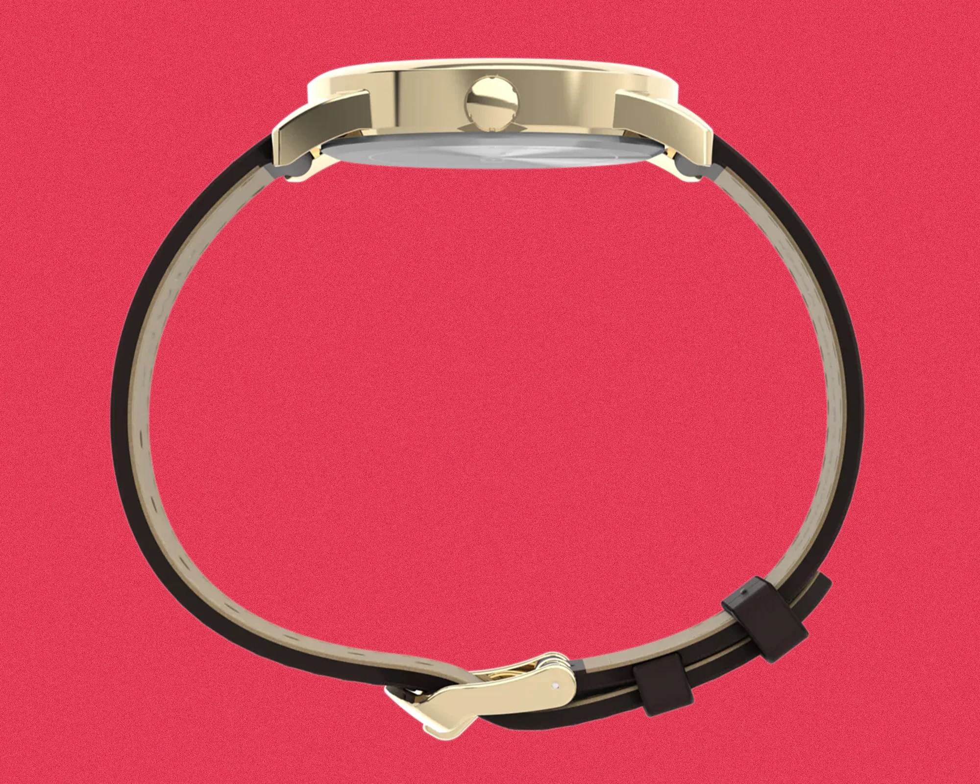 Side view of a gold-tone wristwatch with a black leather strap and gold buckle on a red background.
