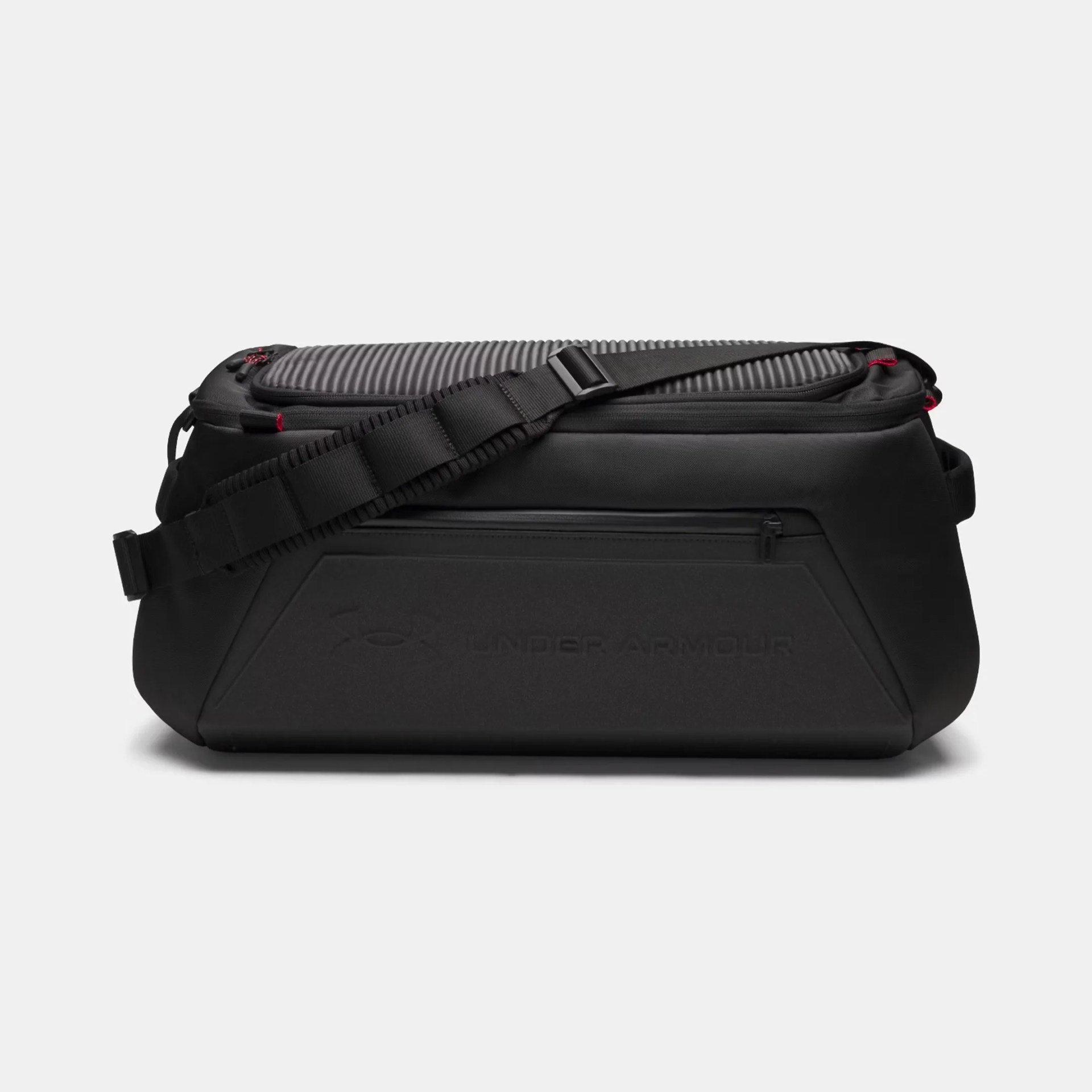 Black Under Armour duffel bag with padded shoulder strap and zippered front pocket.