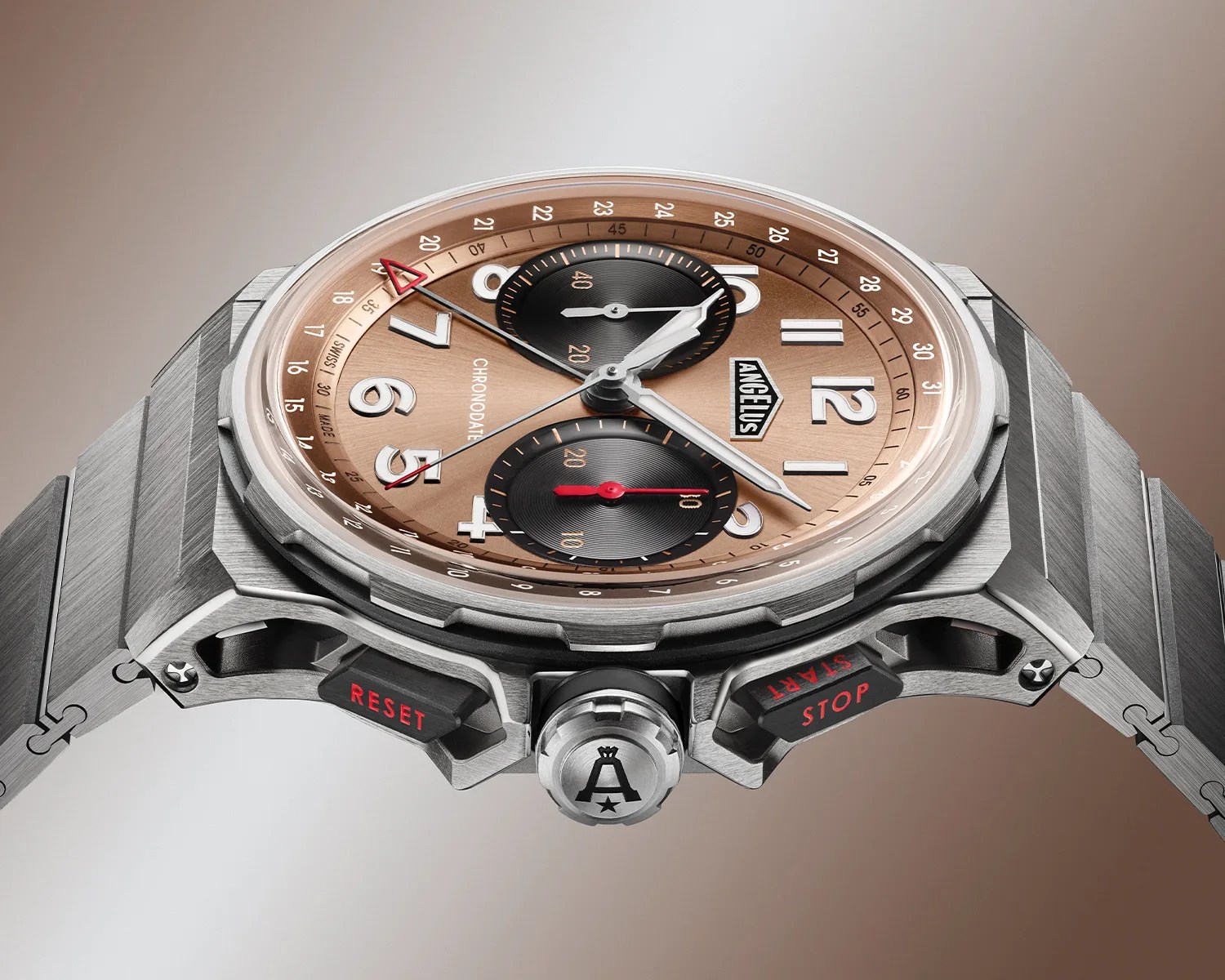 Silver metal chronograph watch with a copper dial, black subdials, and red-accented reset and stop buttons.
