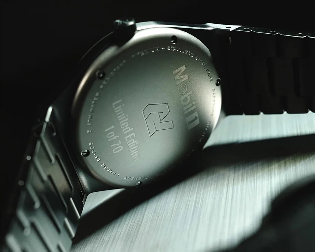 Back of a limited edition Mobil 1 stainless steel watch with black metal band, numbered 1 of 70.
