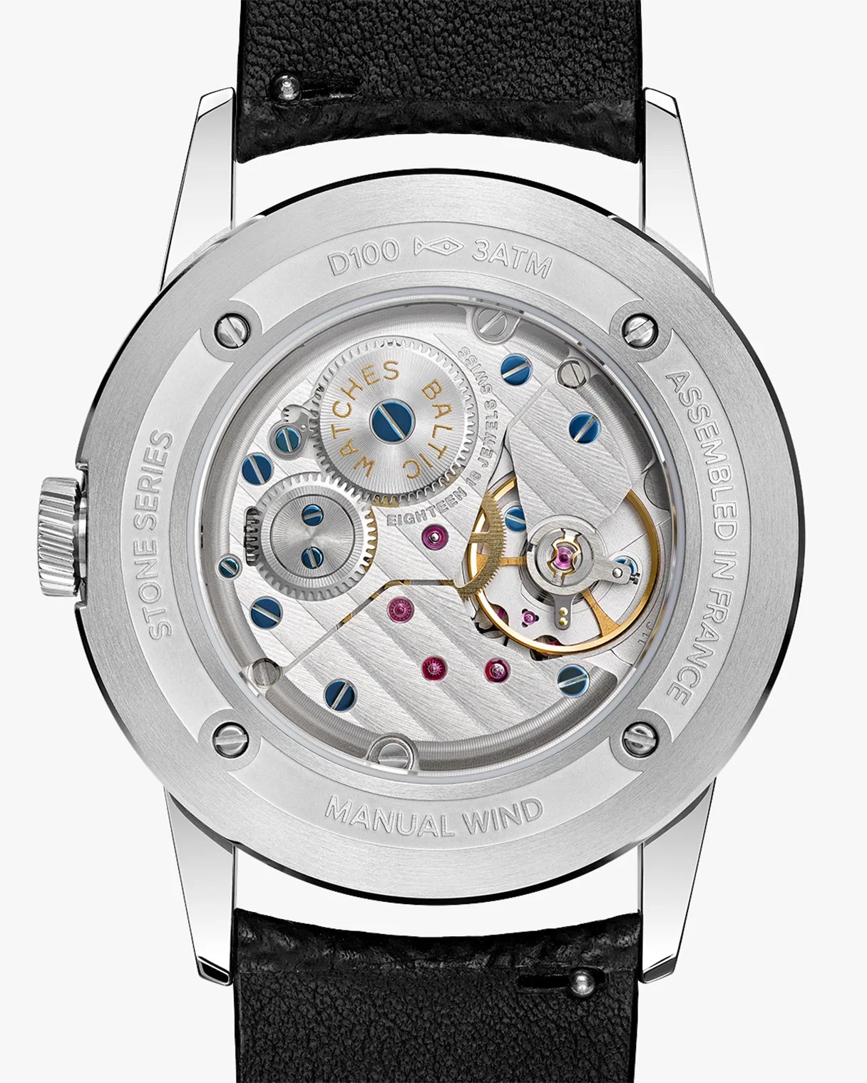 Back of a silver manual wind watch with visible mechanical movement, blue screws, and black leather strap.