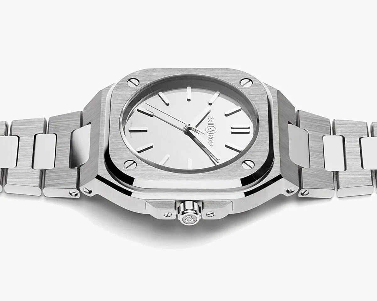 Brushed stainless steel wristwatch with square case, white dial, and matching metal bracelet.