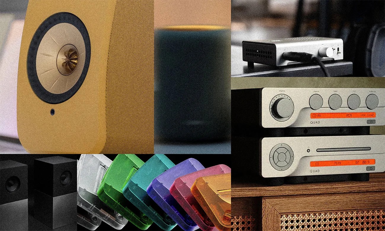 Yellow speaker with a central metallic cone, silver audio equipment with orange displays, and colorful translucent cassette tapes.