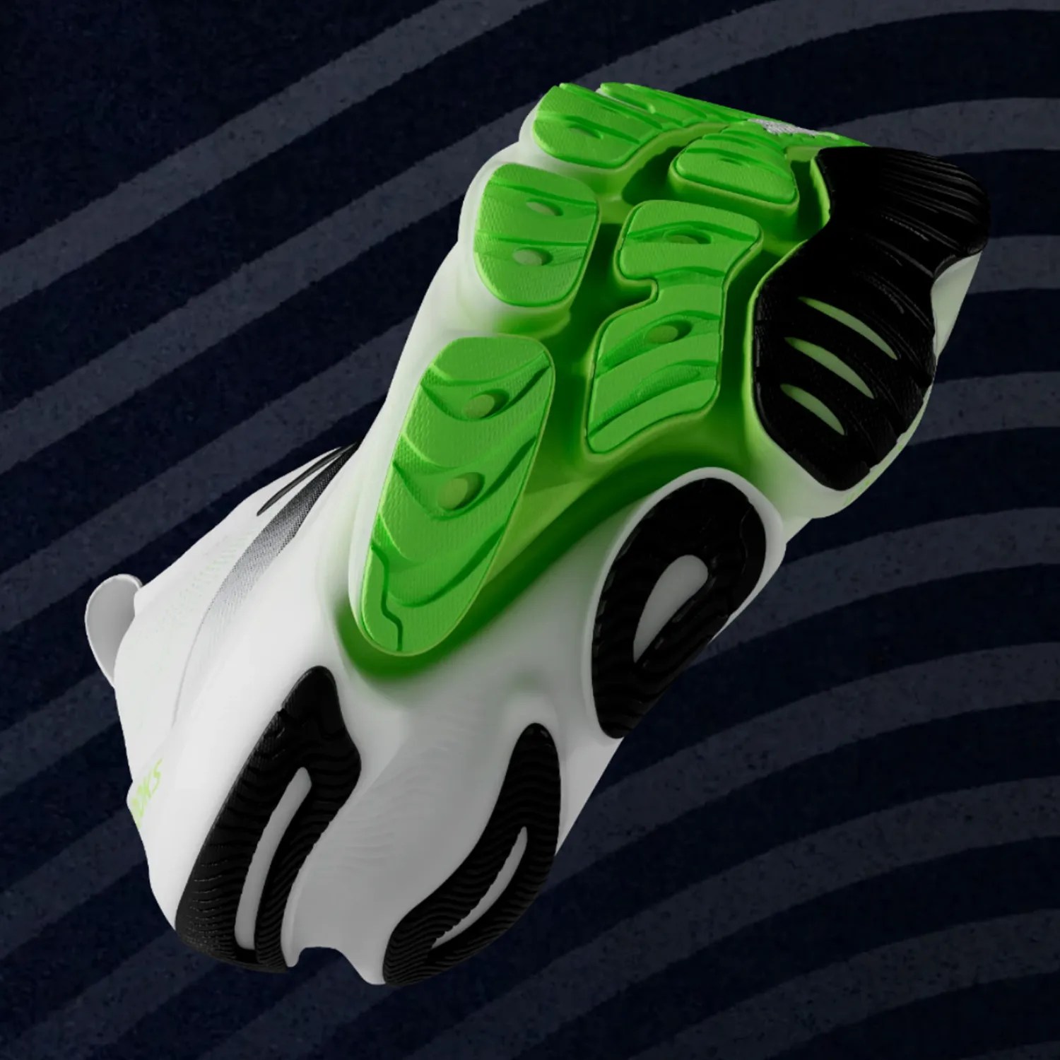 White athletic shoe with black and neon green rubber sole viewed from the bottom.