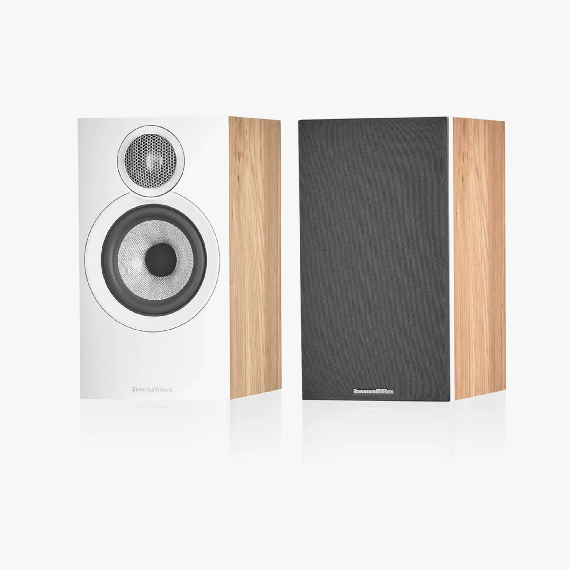 Pair of Bowers & Wilkins bookshelf speakers with white front, natural wood sides, and one speaker covered with a black grille.