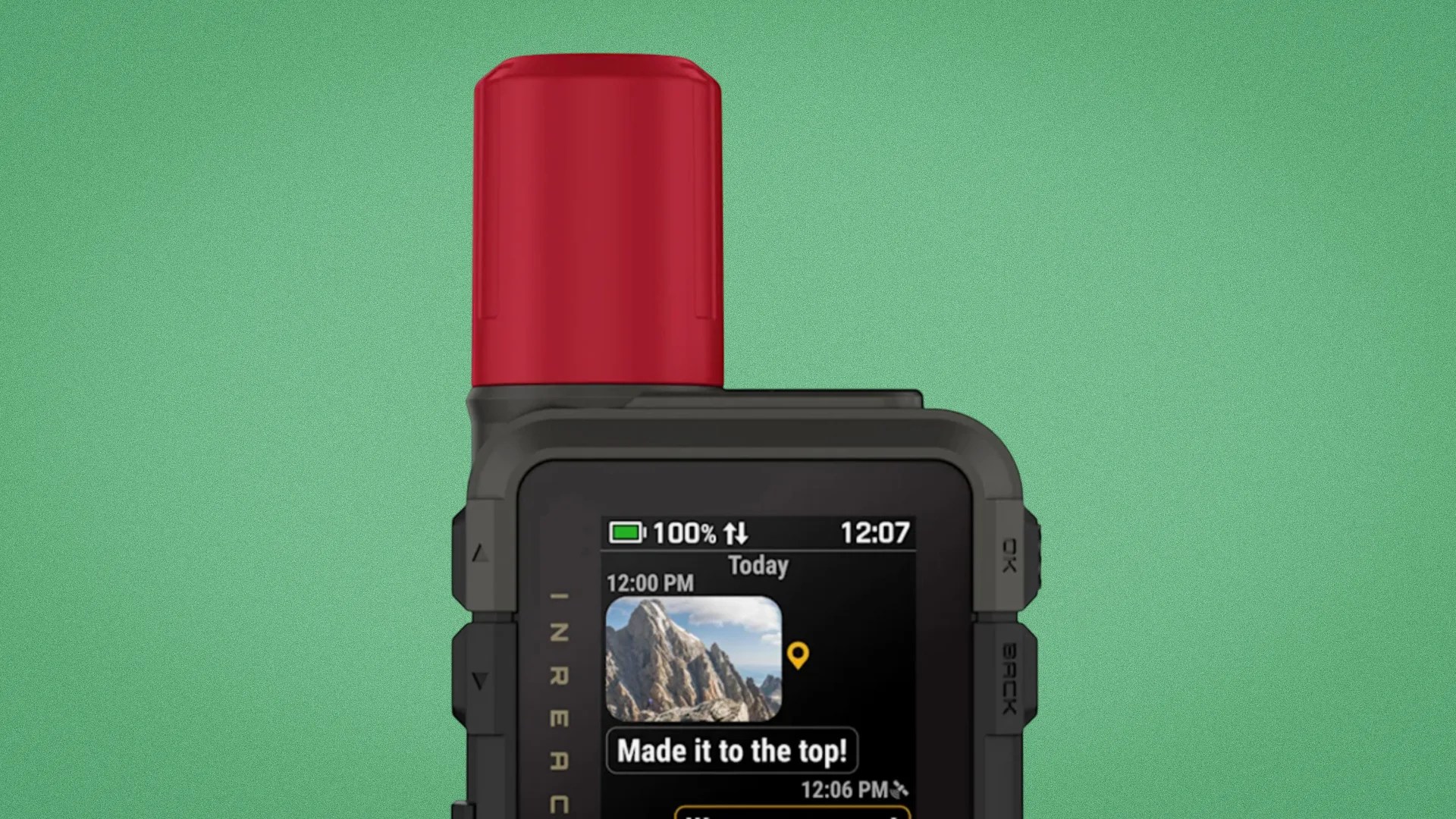 Black Inreach device with red antenna showing a screen with a mountain photo and text "Made it to the top!