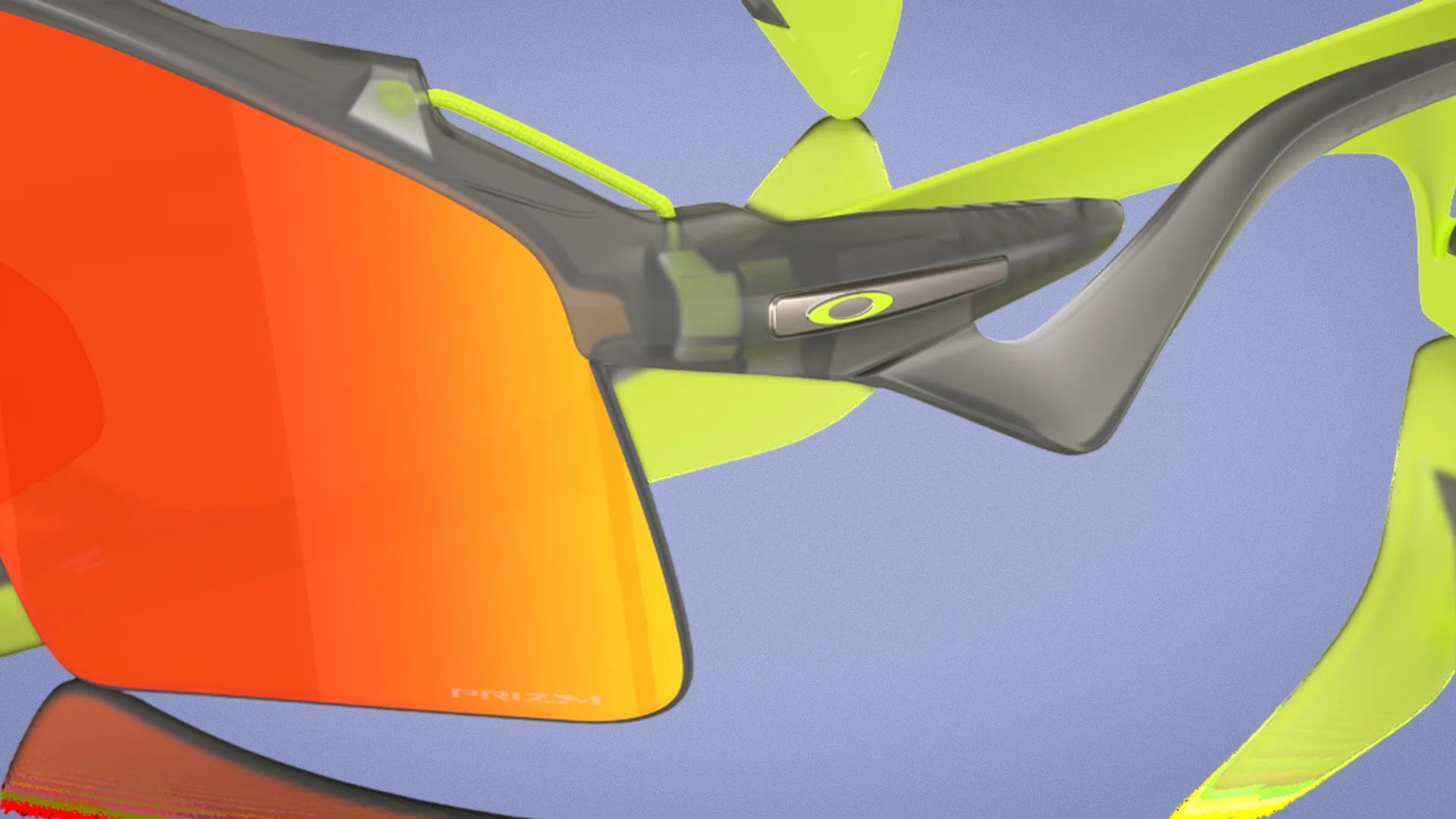 Close-up of Oakley sports sunglasses with orange Prizm lenses and neon yellow and gray frame.