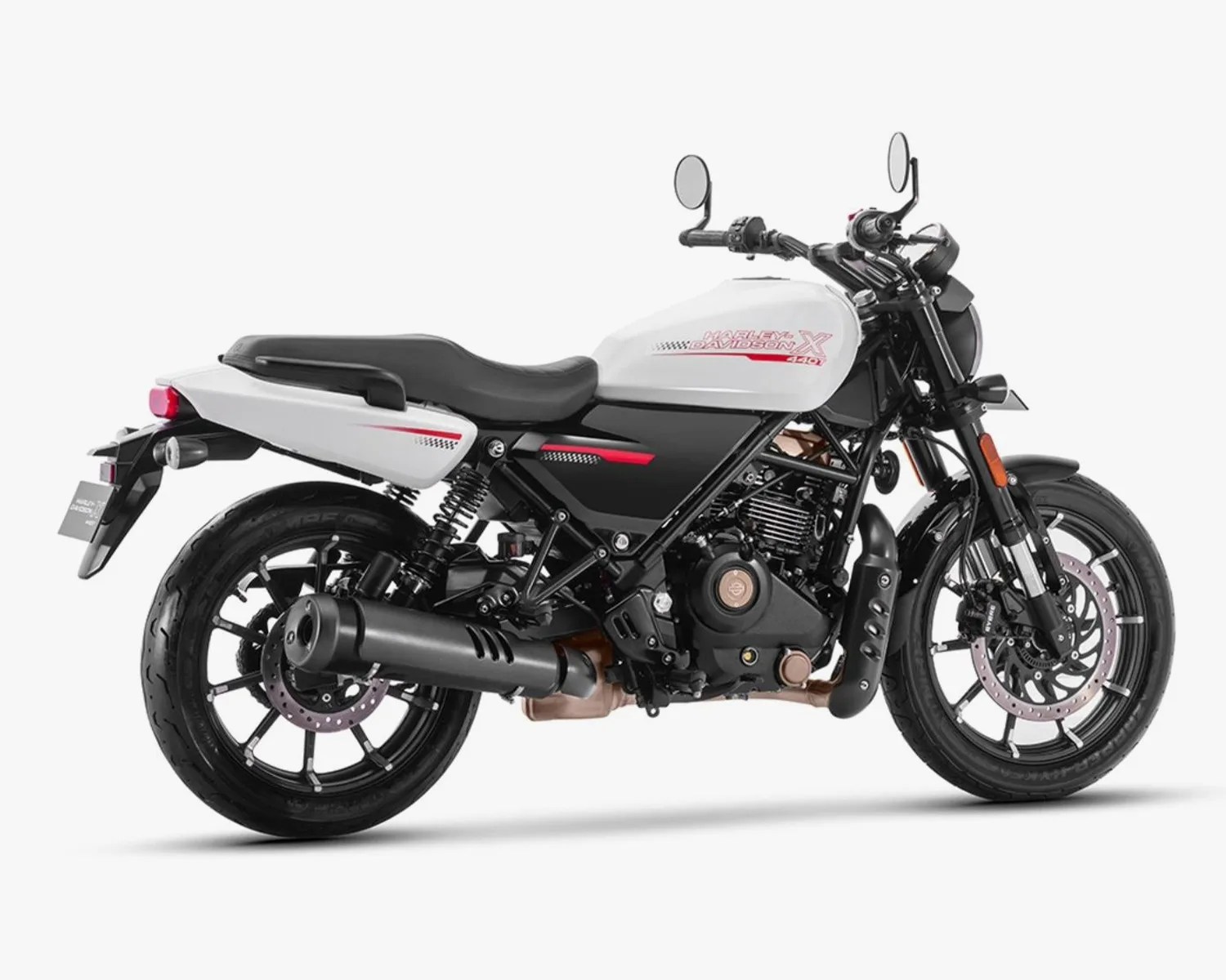 White and black Harley-Davidson motorcycle with red accents and black exhaust on a white background.