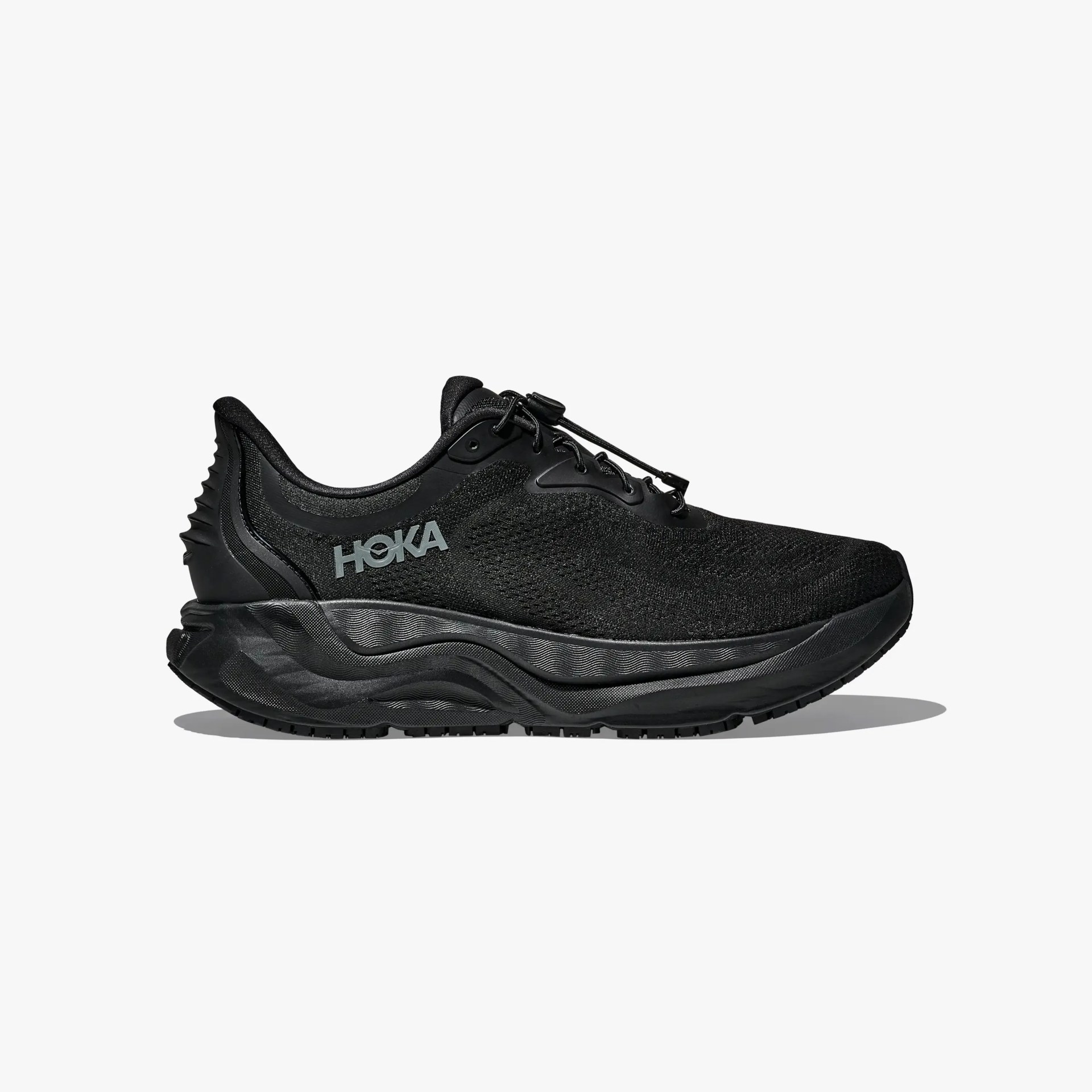 Black HOKA running shoe with textured mesh upper and thick cushioned sole.