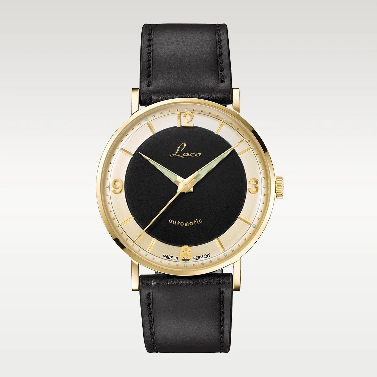 Gold-tone round watch with black center dial, gold numerals, and black leather strap.