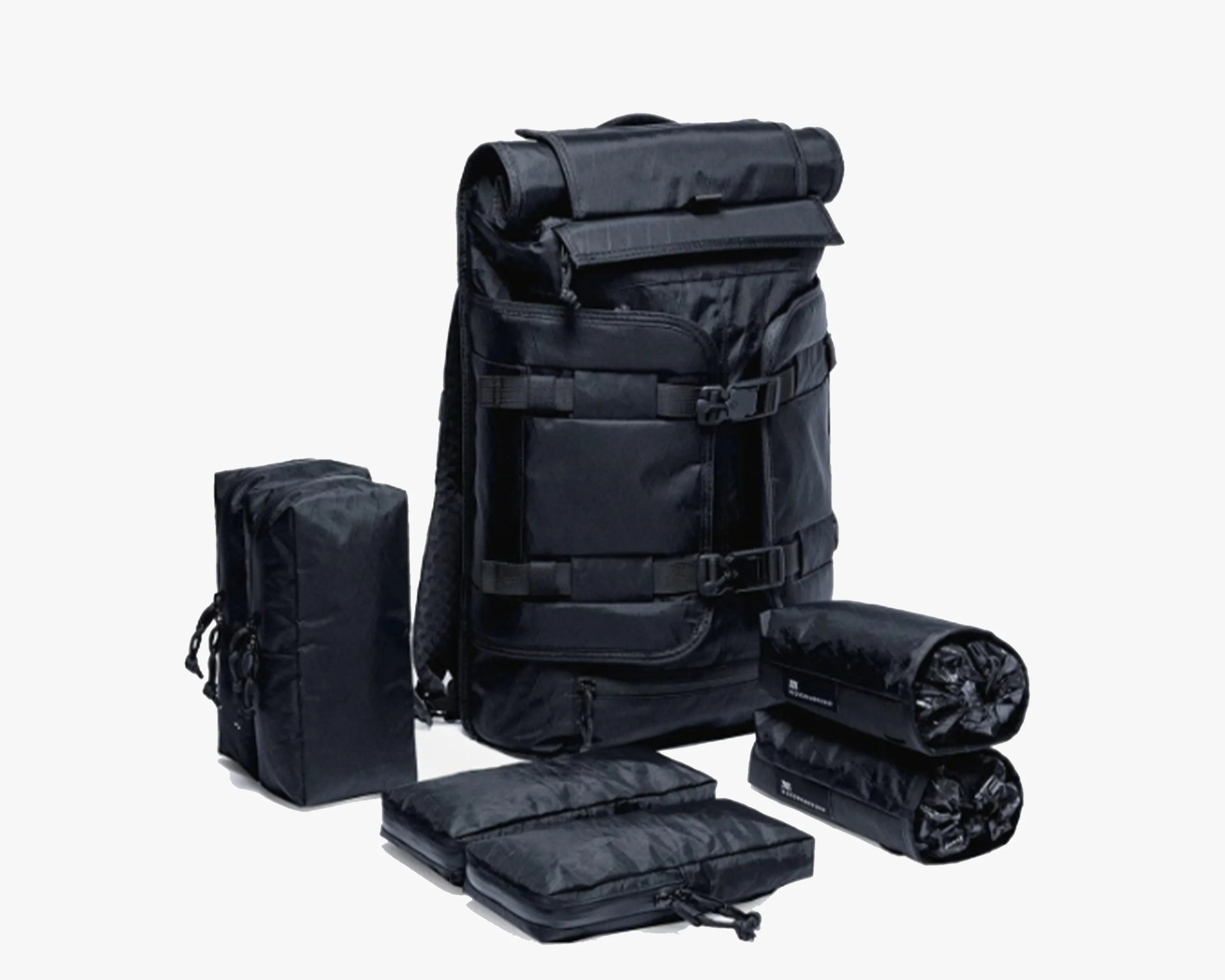 Black roll-top backpack with multiple detachable black pouches and organizers arranged around it.