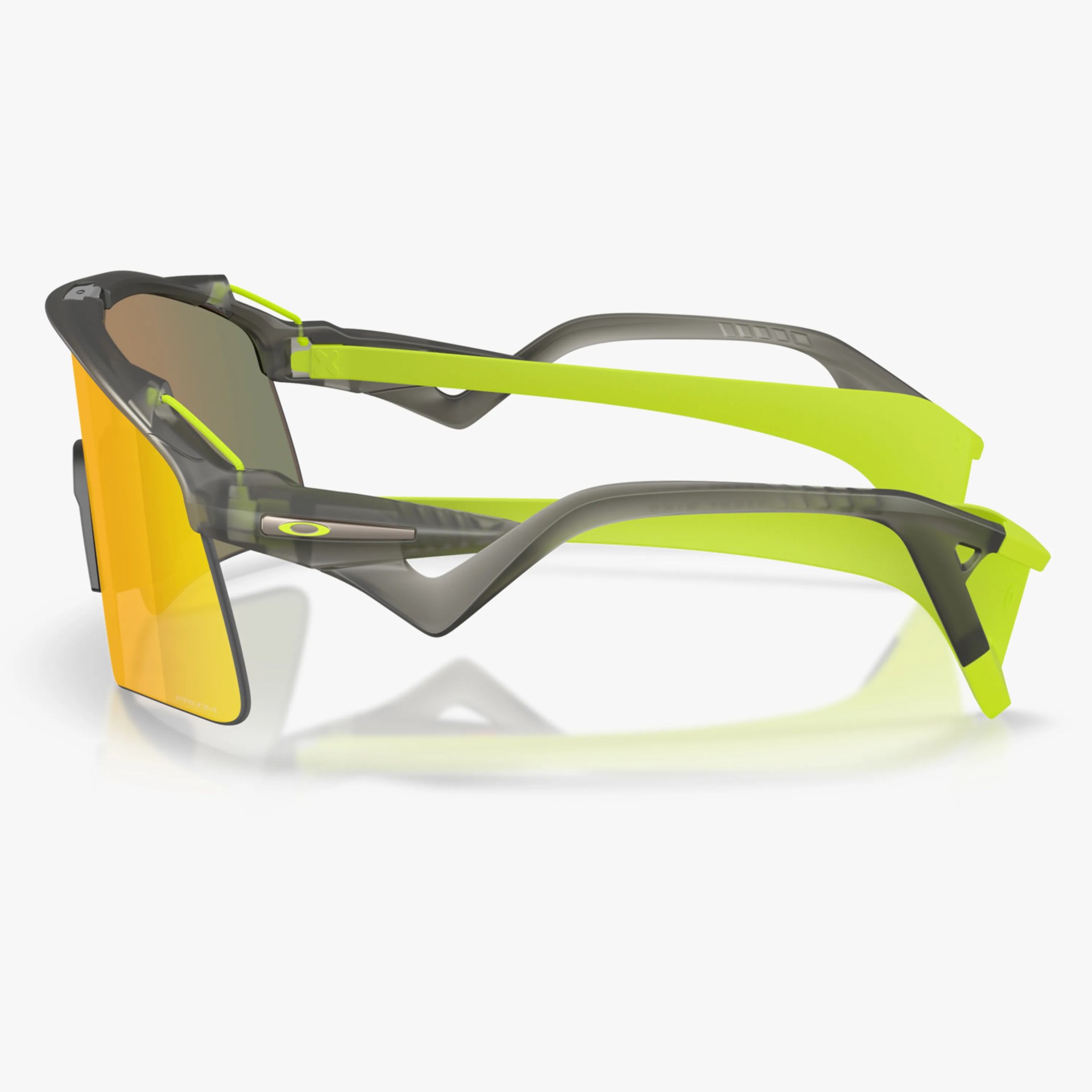 Sport sunglasses with yellow-orange lenses and translucent gray and neon yellow frames.