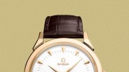 Gold Omega wristwatch with white dial, gold hour markers, and dark brown leather strap.