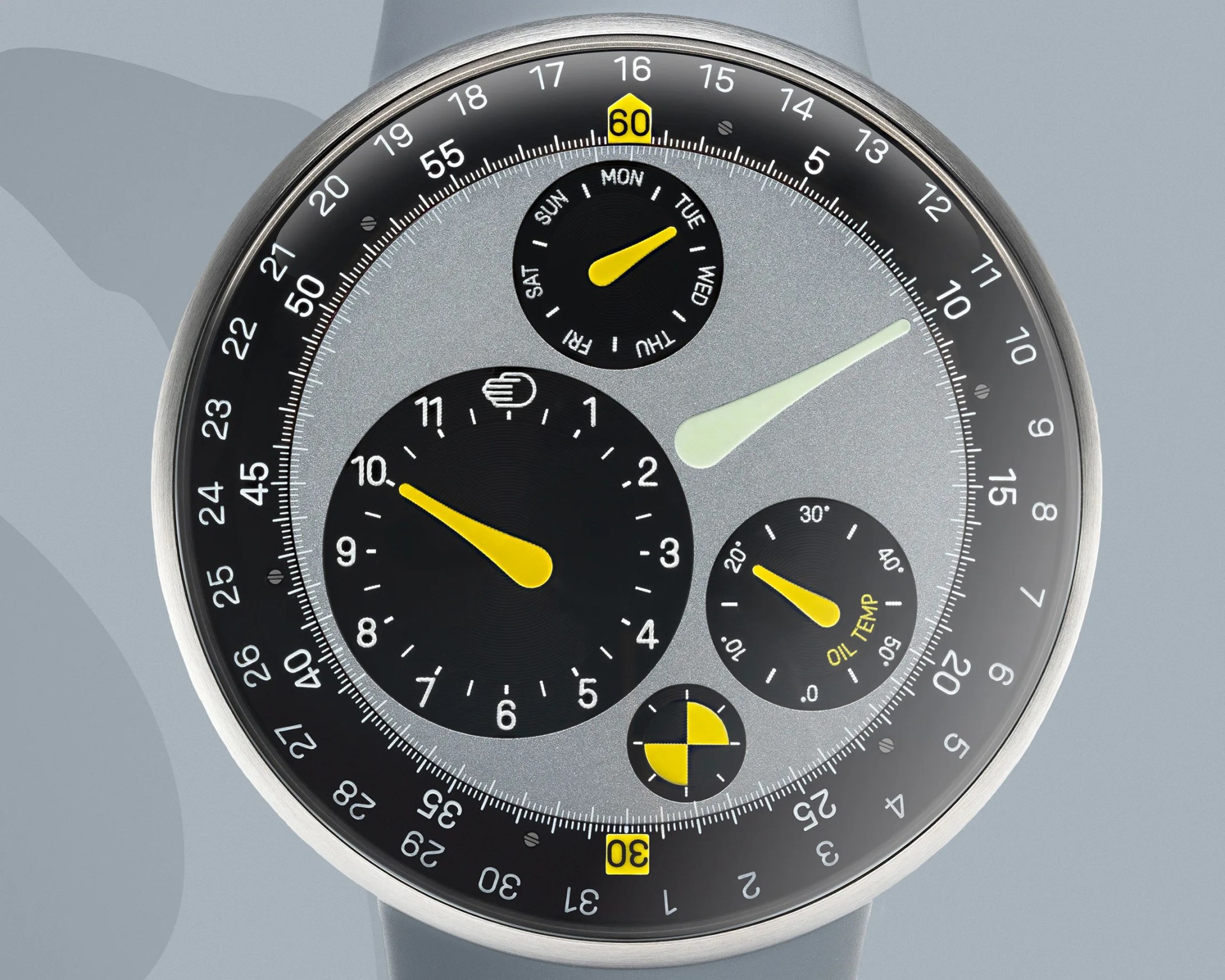 Round smartwatch with a silver bezel, gray dial, and multiple black subdials with yellow hands and indicators.