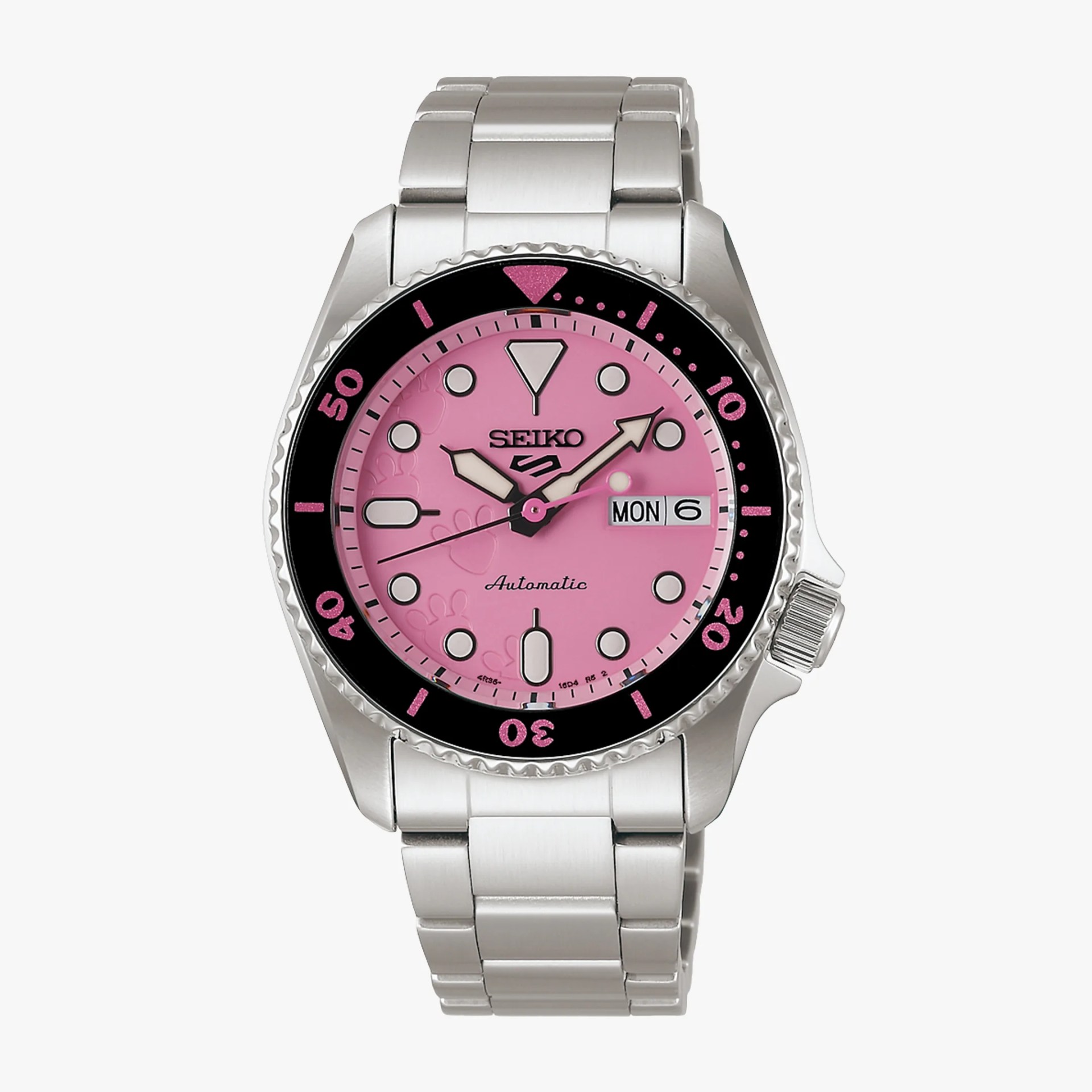 Silver stainless steel Seiko wristwatch with a pink dial, black bezel, and day-date display.