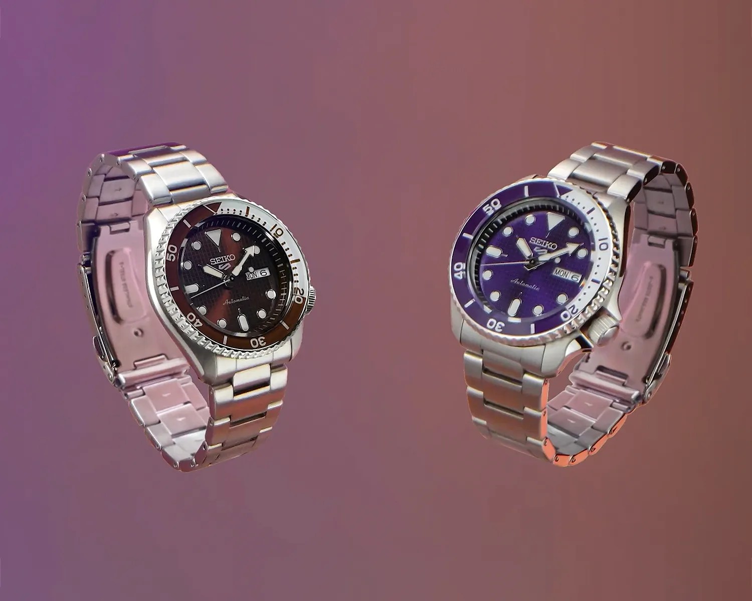 Two Seiko automatic wristwatches with stainless steel bands, one with a brown dial and the other with a purple dial, on a purple background.