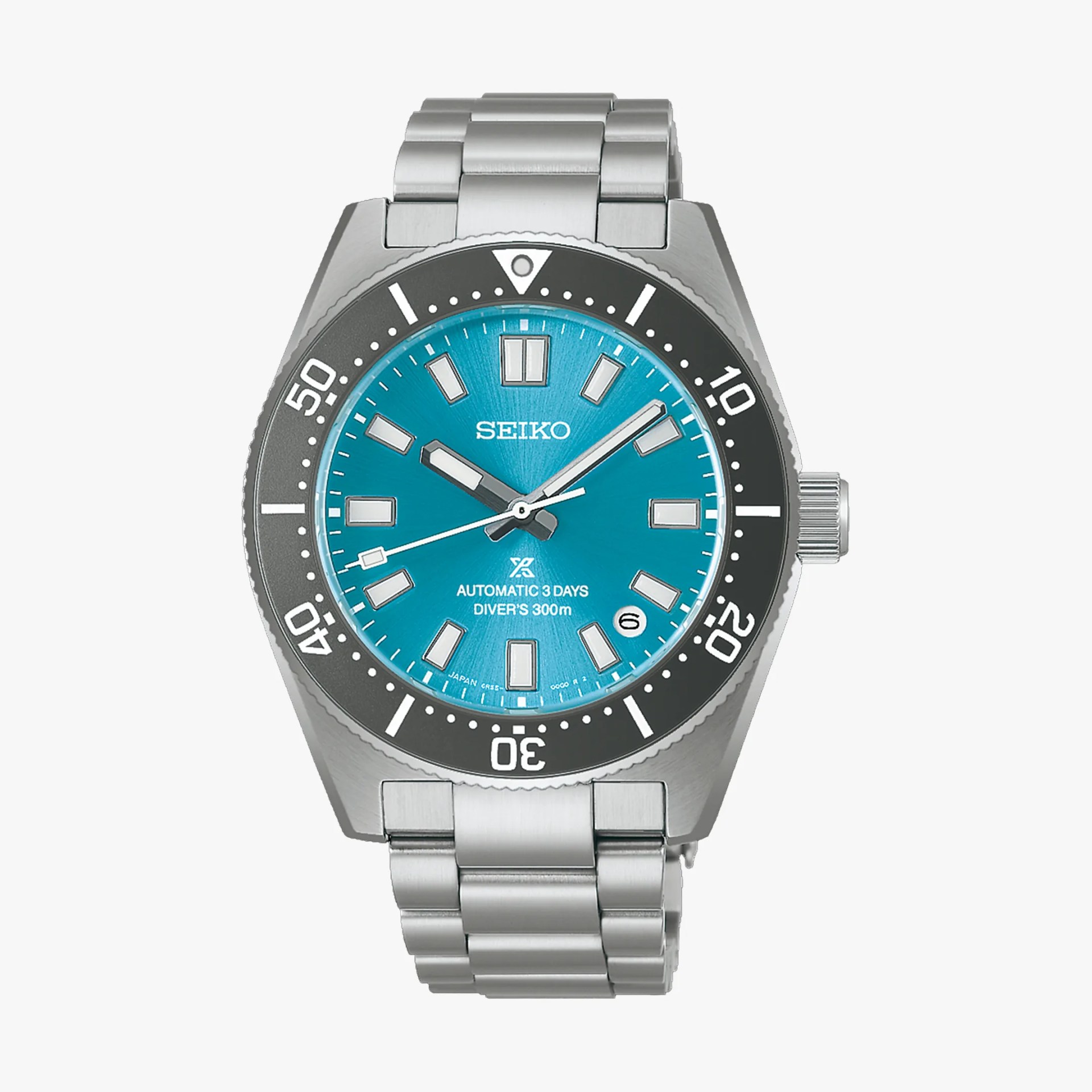 Seiko stainless steel diver's watch with turquoise dial and black bezel, date window at 4 o'clock.