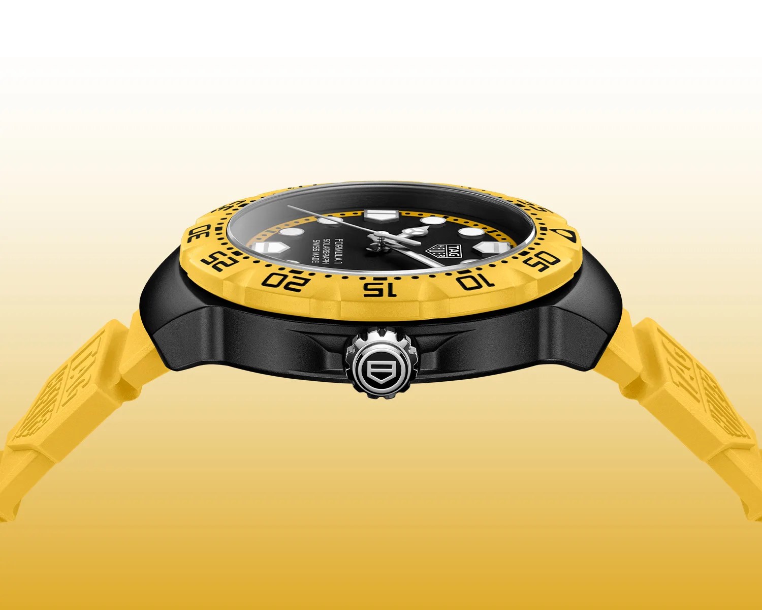 Black and yellow TAG Heuer Formula 1 wristwatch with a yellow bezel and strap, shown from the side.
