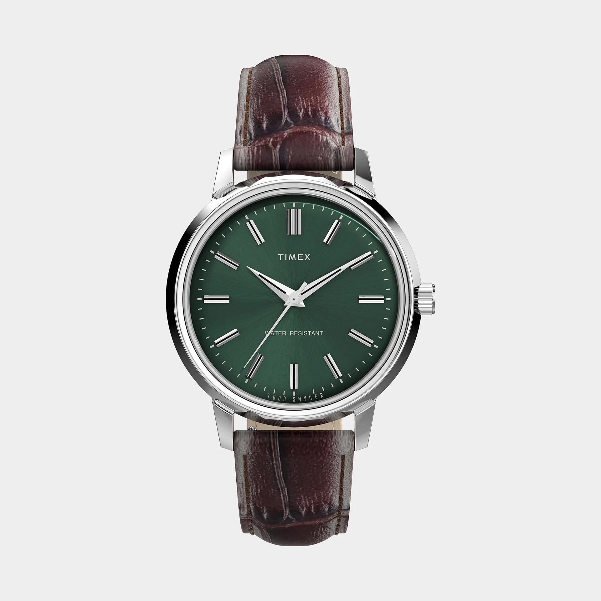 Silver Timex wristwatch with a green dial and brown leather strap.