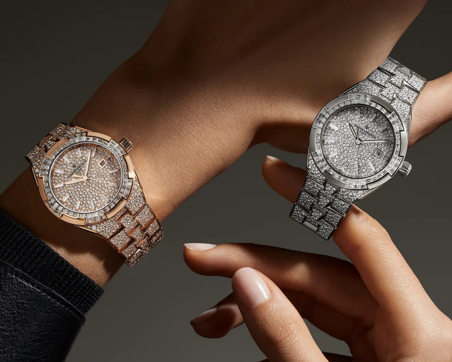 Two diamond-encrusted luxury watches, one rose gold on a wrist and one white gold held between fingers.