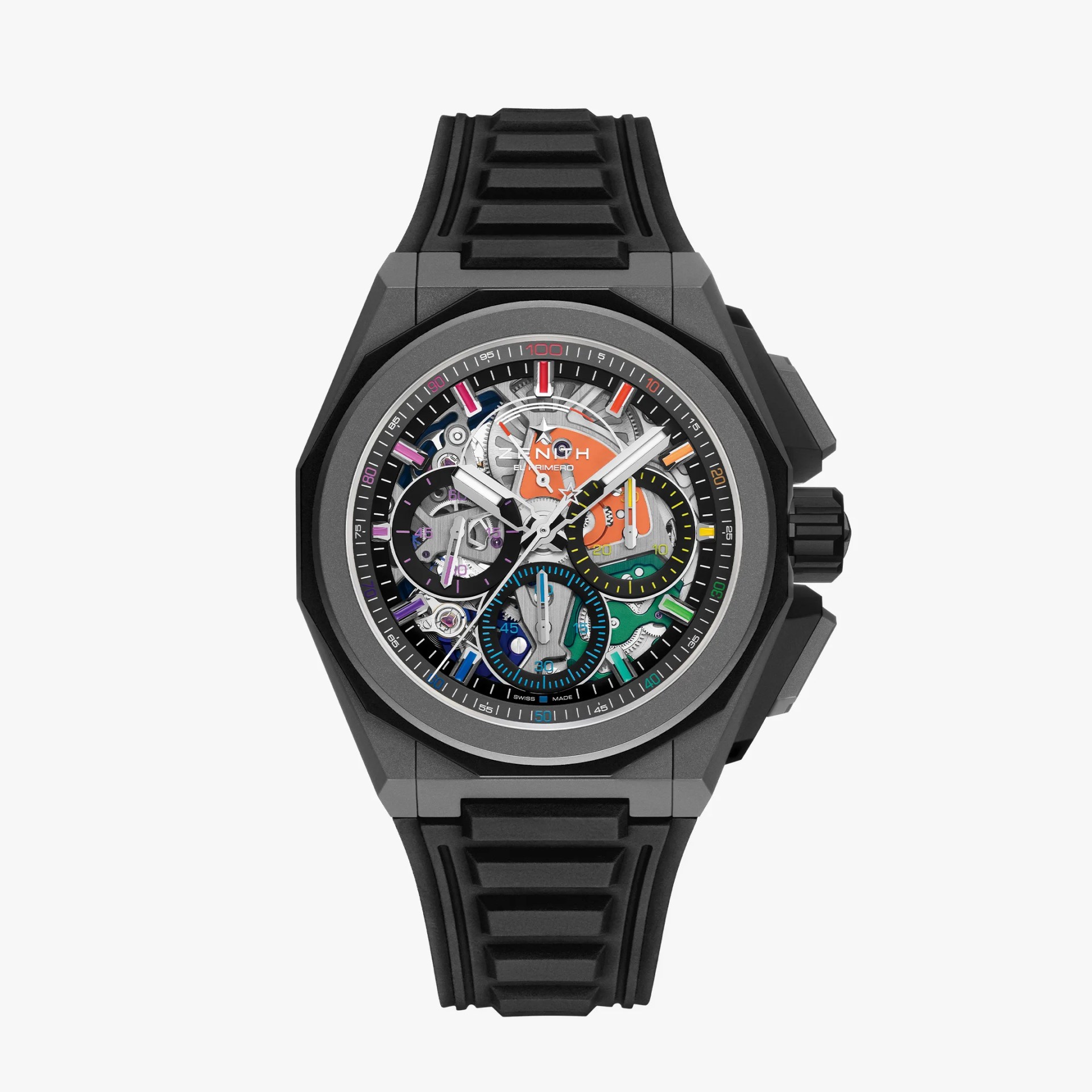 Black rubber strap wristwatch with a multi-colored skeleton dial and chronograph subdials.