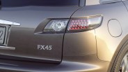 Rear side of a metallic gray FX45 car showing the taillight, fuel cap, and part of the rear wheel.
