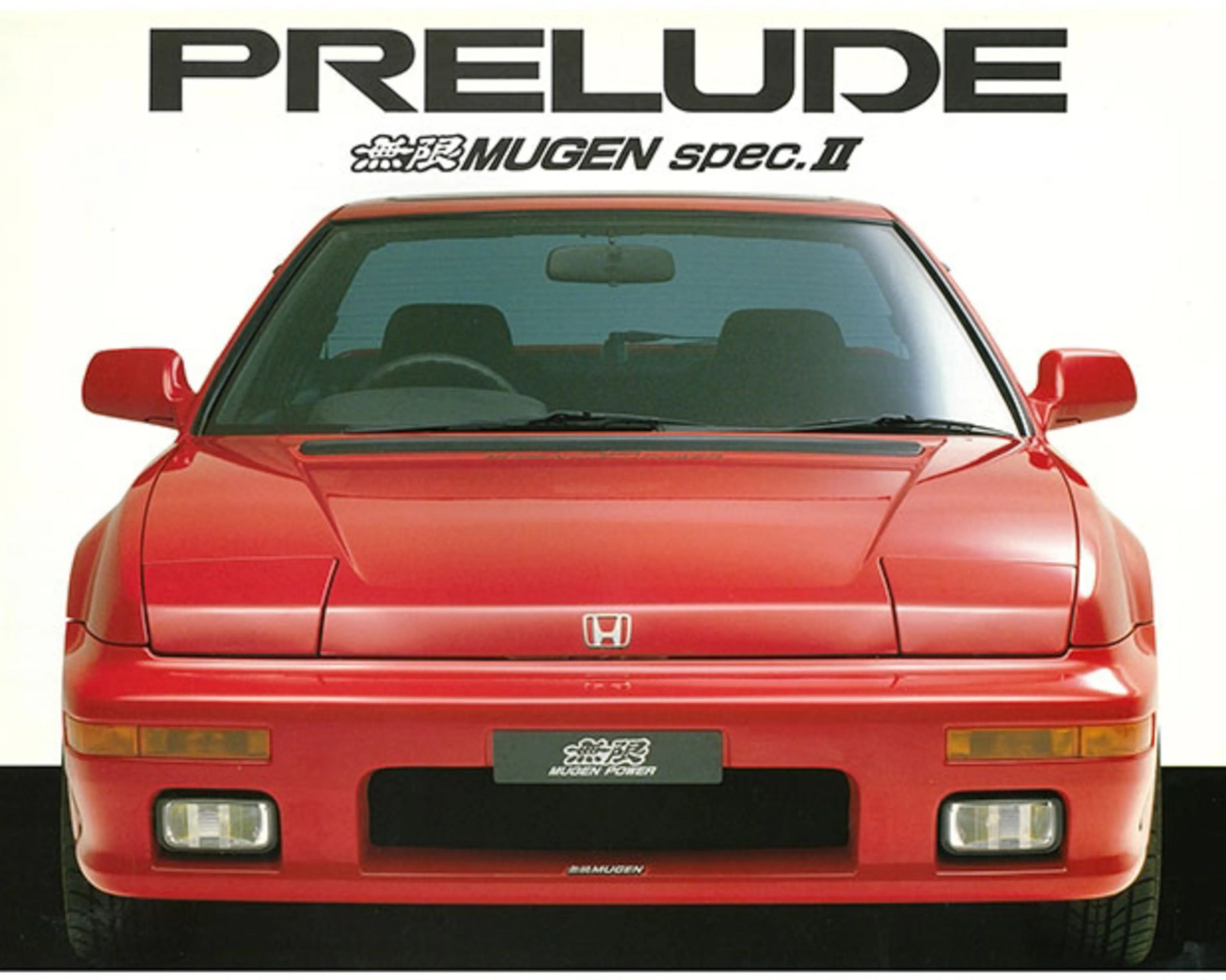 Front view of a red Honda Prelude Mugen Spec II with pop-up headlights and fog lights.