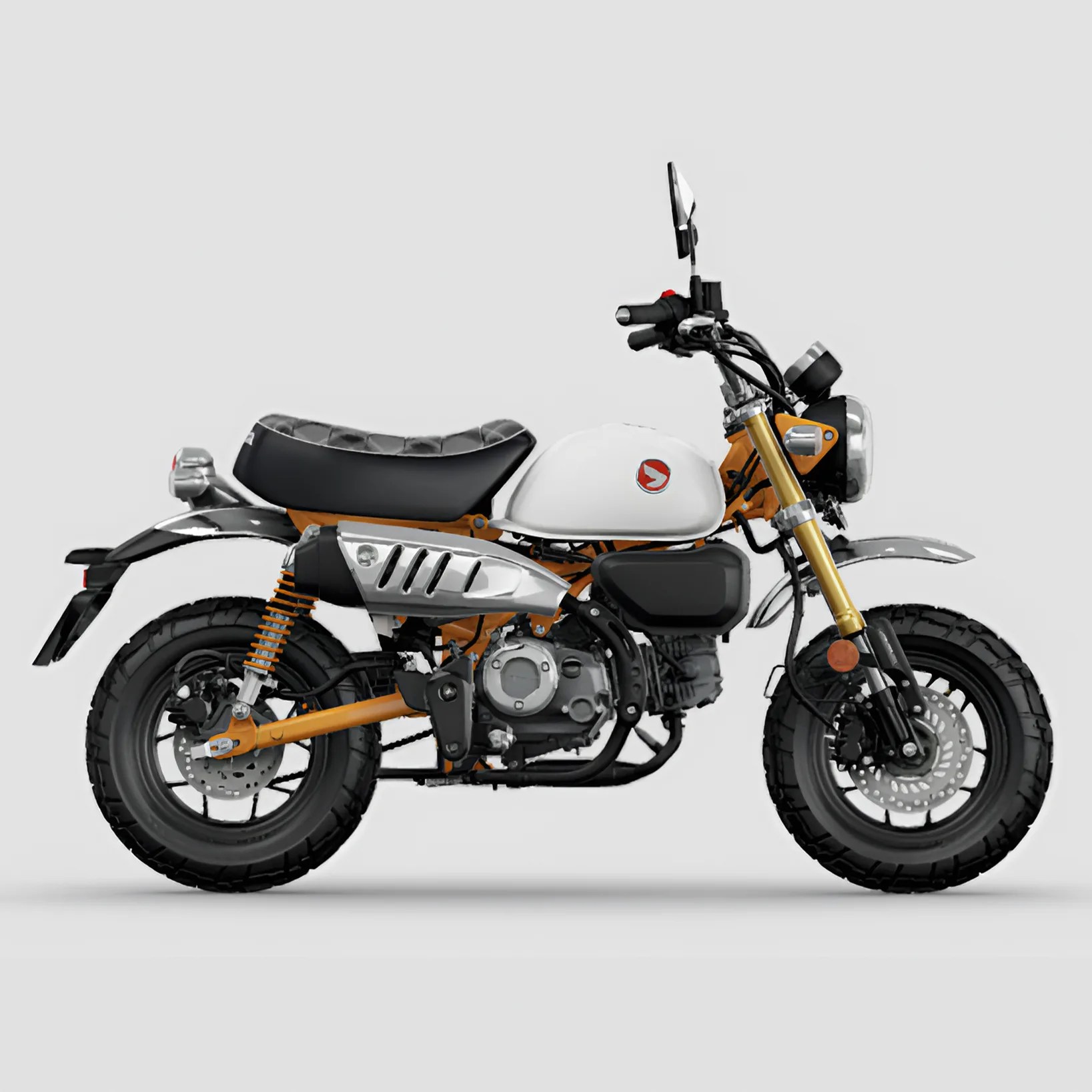 White and orange Honda Monkey motorcycle with black seat and tires on a gray background.