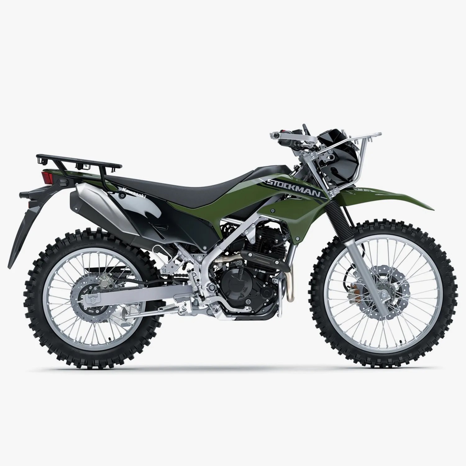 Green and black Kawasaki Stockman dual-sport motorcycle with knobby tires and rear cargo rack on a white background.