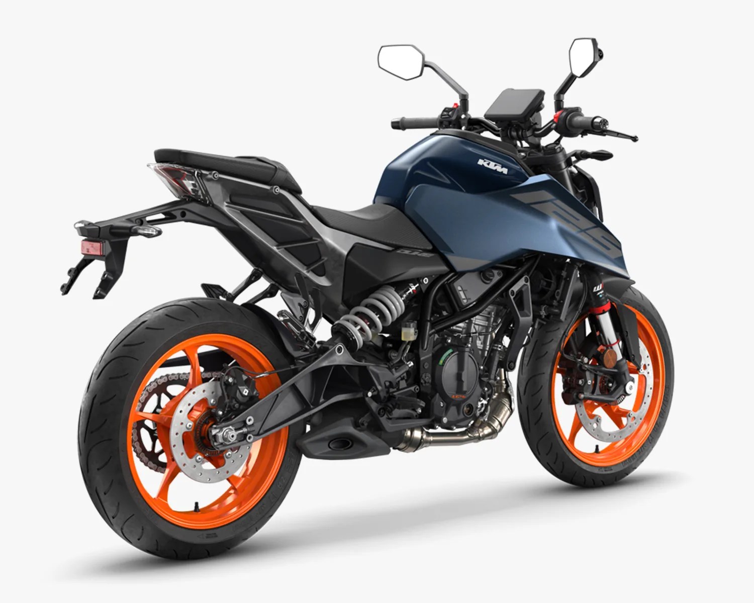 Blue KTM motorcycle with bright orange wheels and black frame shown from rear side angle.