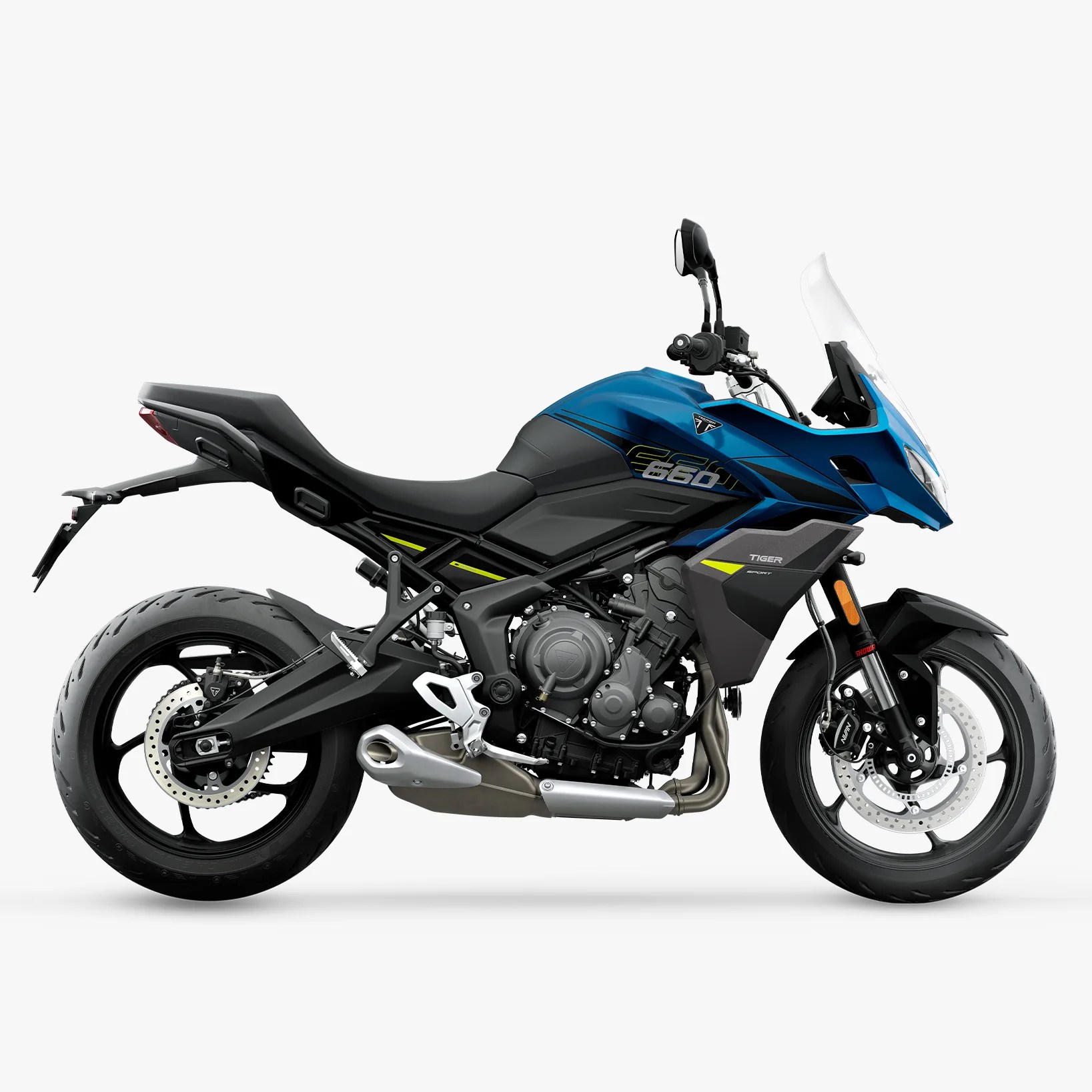 Blue and black Triumph Tiger 660 sport motorcycle with windshield and disc brakes on white background.