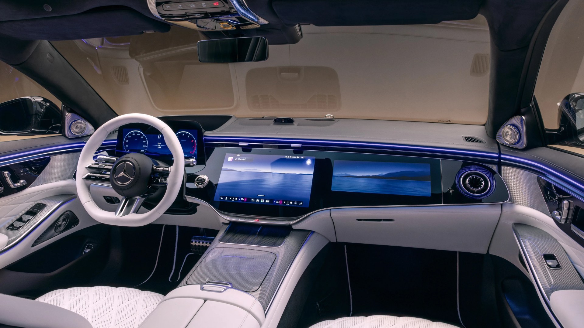 Luxury car interior with white leather steering wheel, dual digital displays, ambient blue lighting, and quilted white seats.