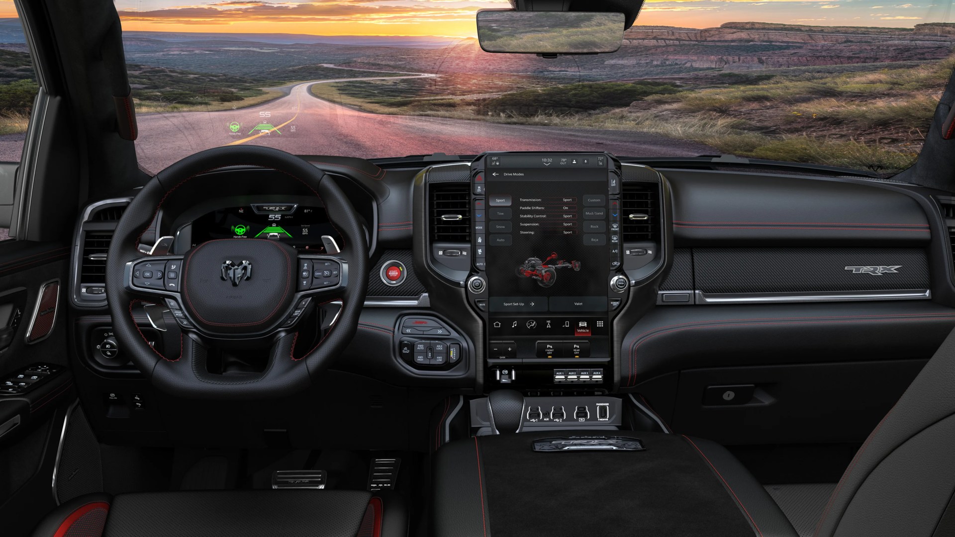 Interior of a black and red-trimmed Ram TRX truck showing a digital dashboard, large touchscreen, and steering wheel with Ram logo.