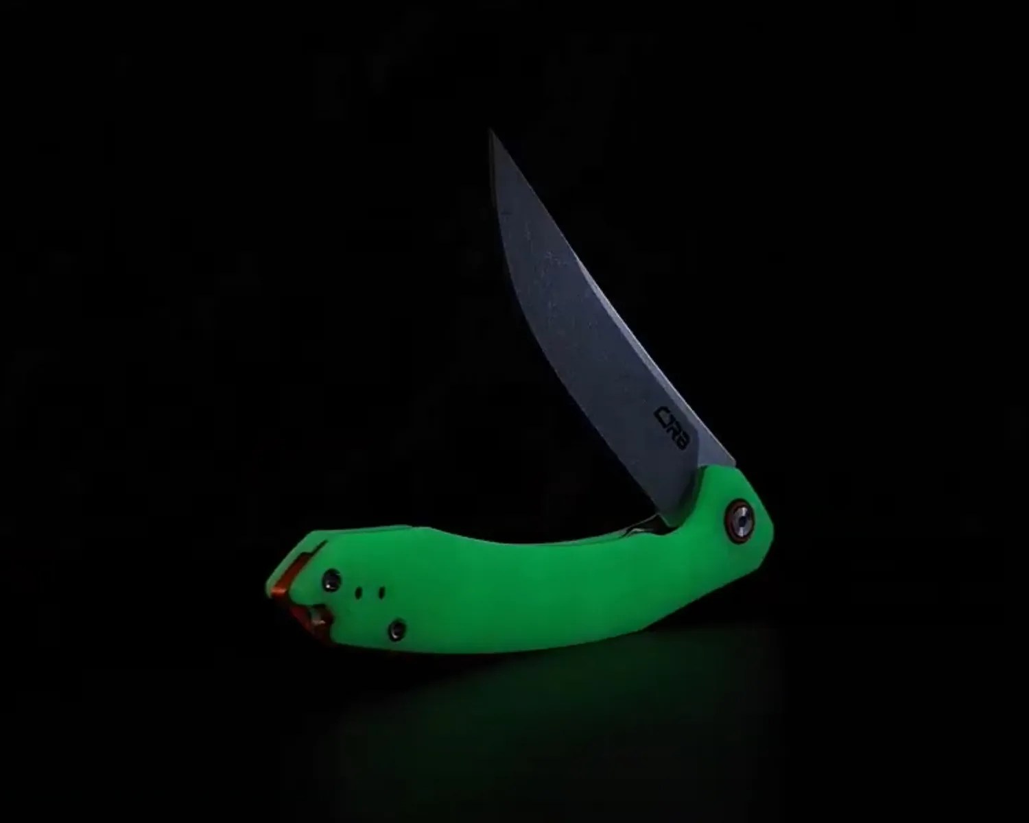 Folding knife with a partially open silver blade and a bright green handle against a black background.