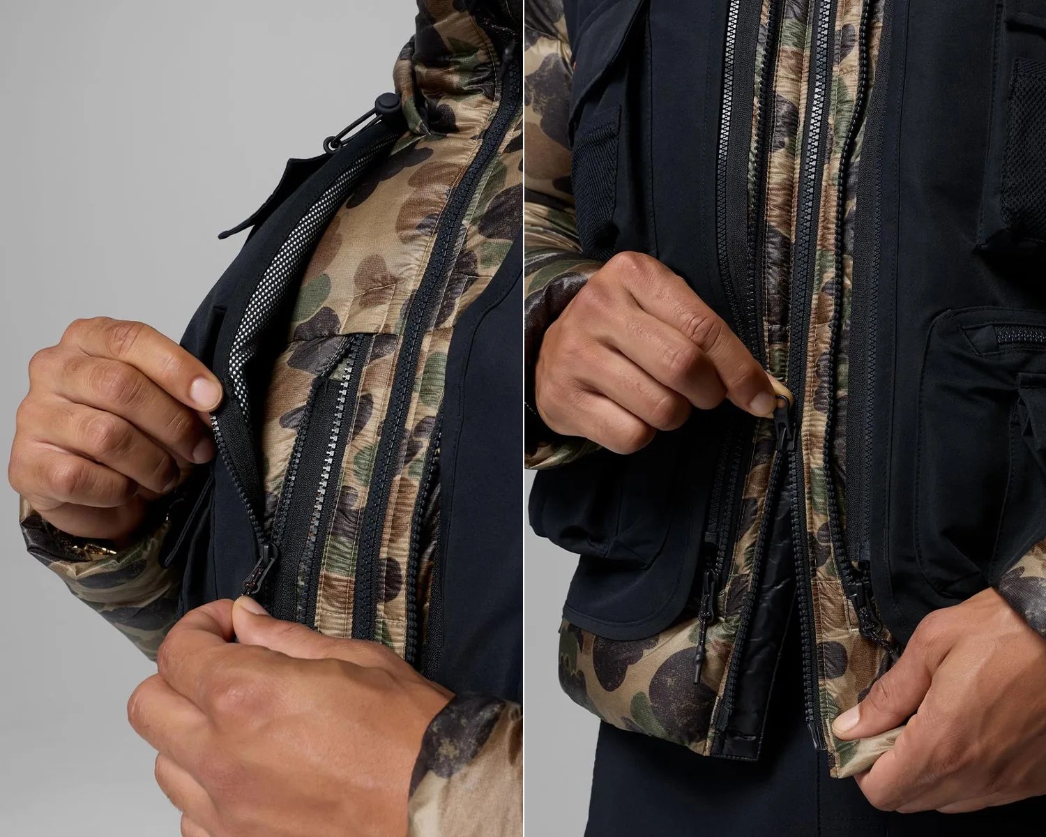 Close-up of hands zipping a black vest over a camouflage-patterned jacket.