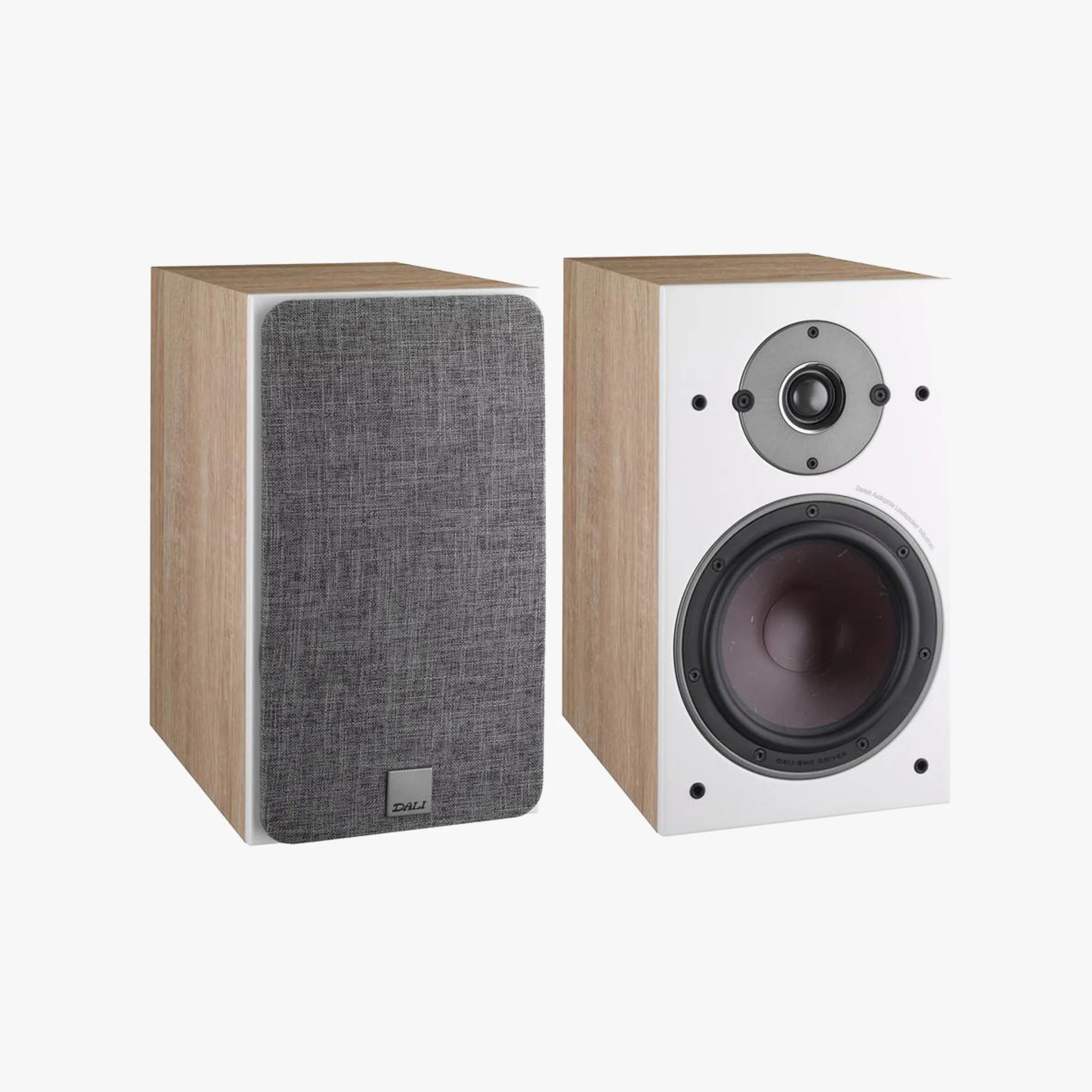 Pair of bookshelf speakers with light wood sides, white front panels, one covered with gray fabric grille.