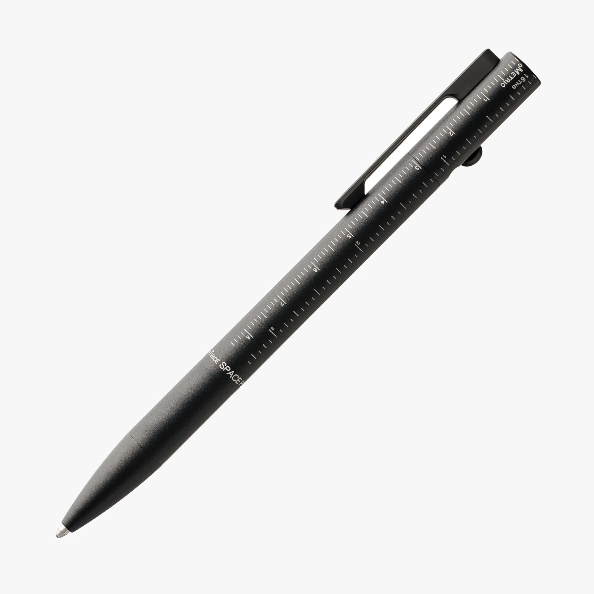 Black metal pen with a built-in ruler marked in inches along the barrel and a clip on the cap.