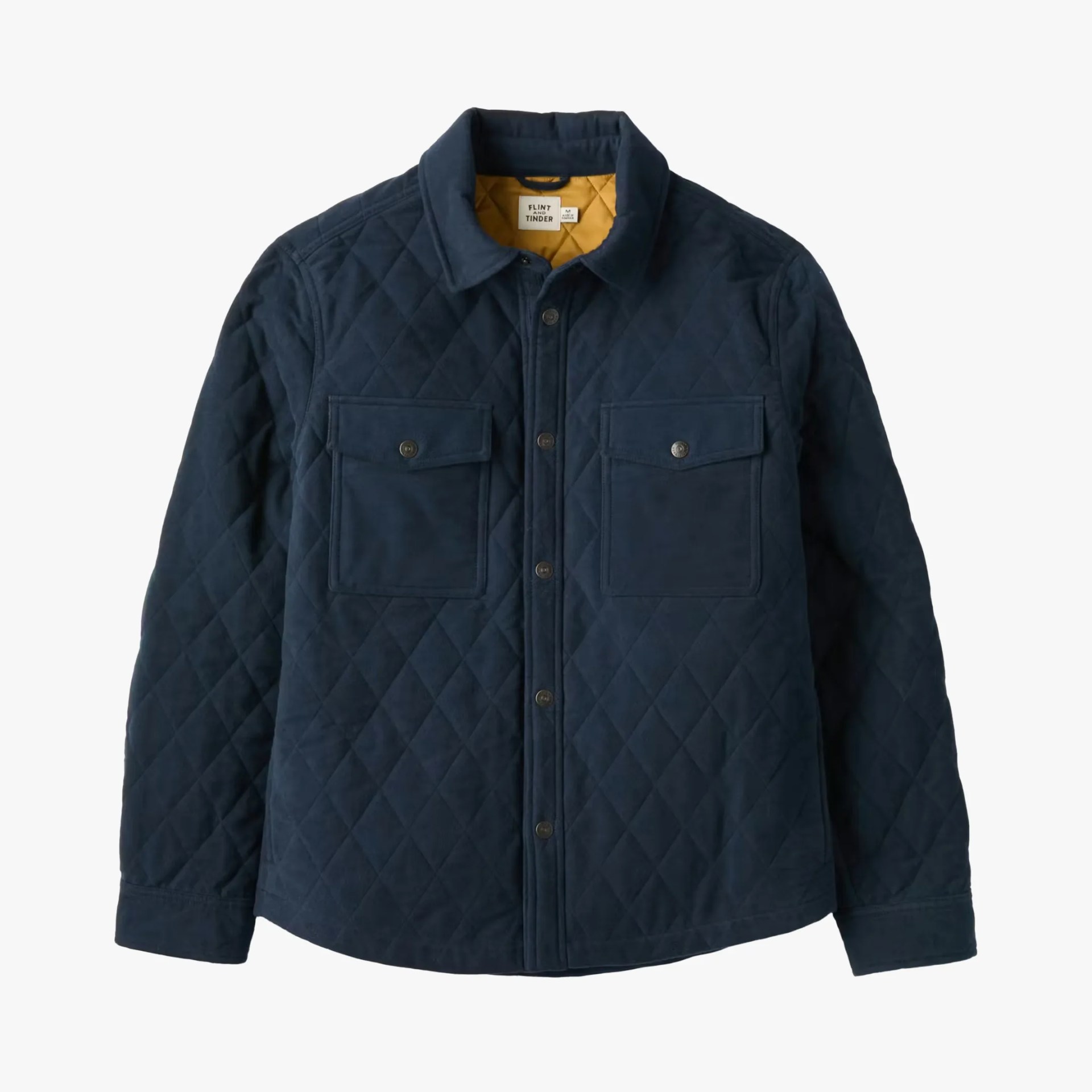 Navy blue quilted jacket with buttoned chest pockets and mustard yellow lining.