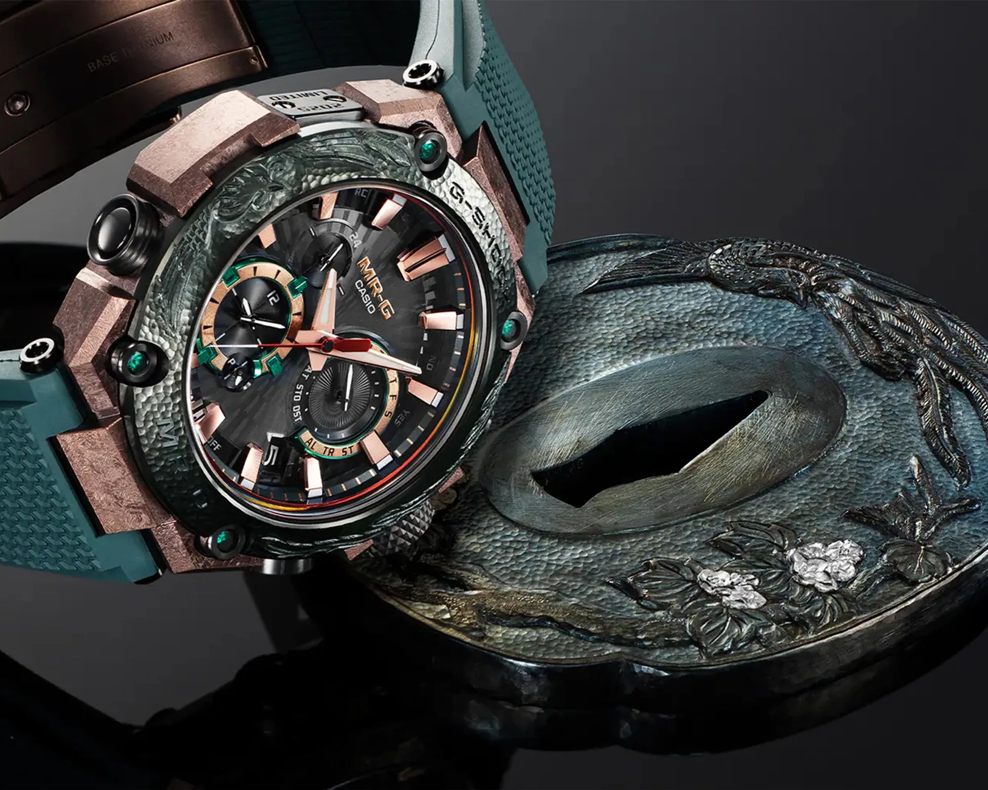 Casio MRG wristwatch with green textured bezel, rose gold accents, and teal strap resting on a decorative metal object.