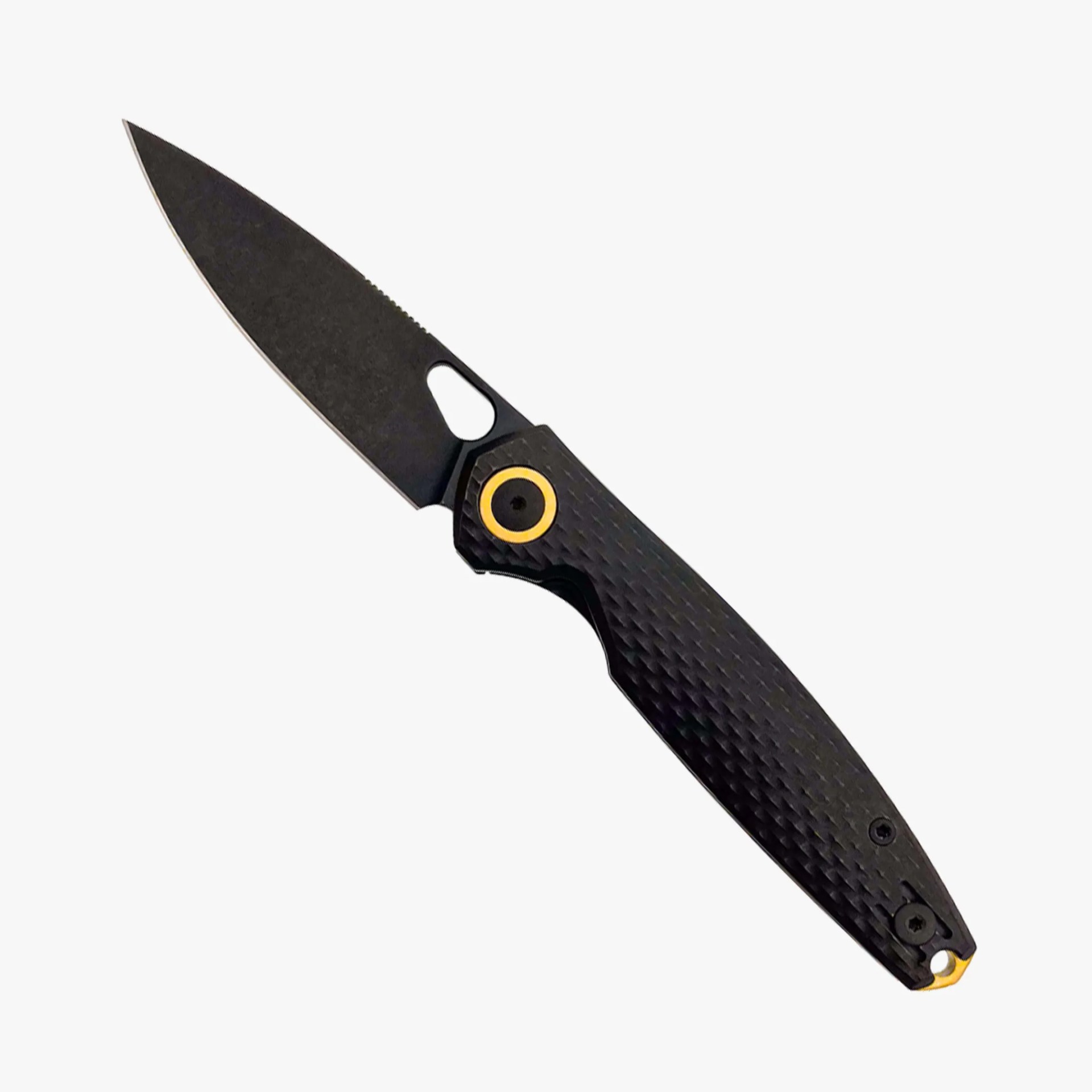 Black folding knife with textured handle and gold accent near the pivot on a white background.