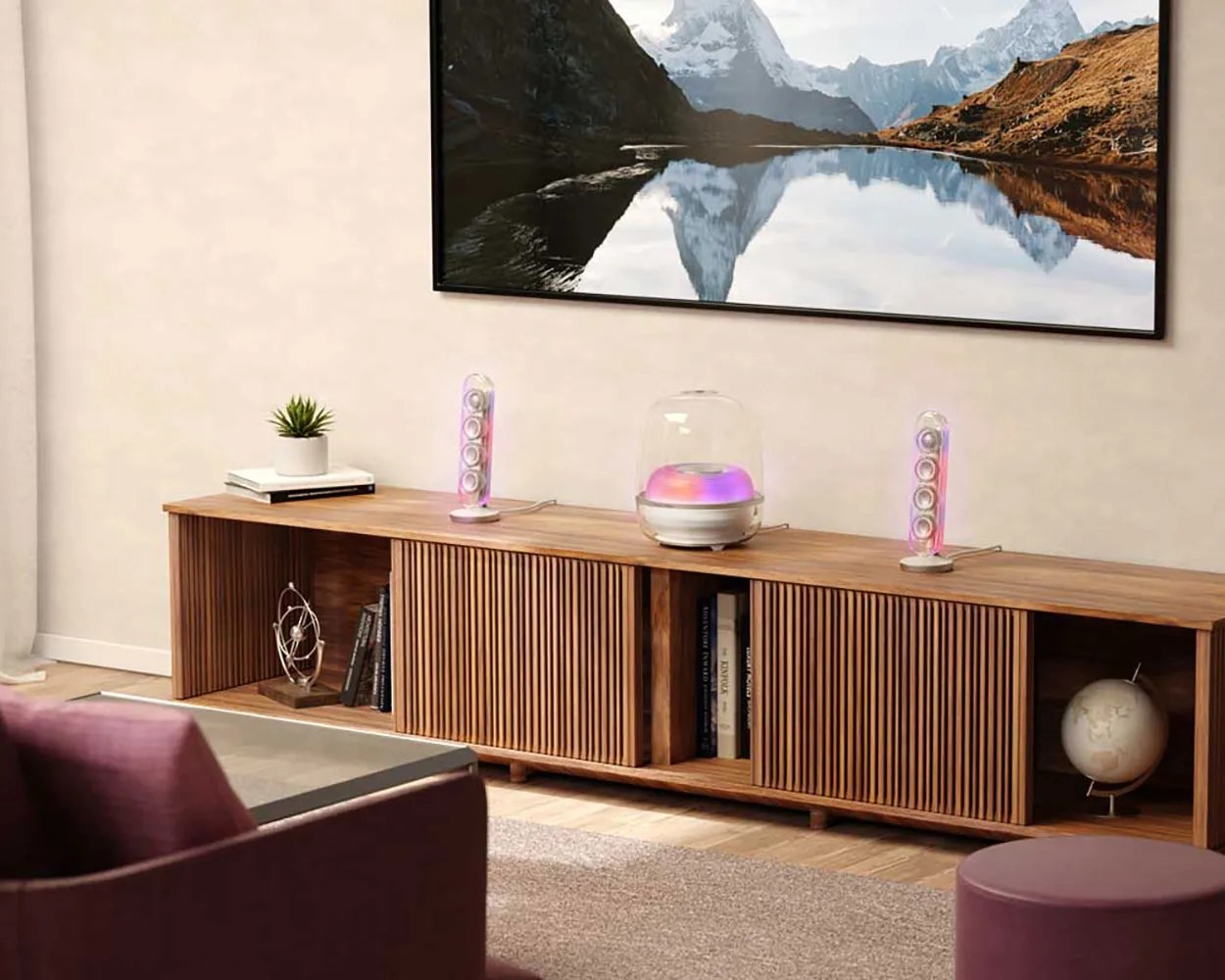 Wooden media console with slatted doors holding books, a globe, and decorative items under a wall-mounted TV.