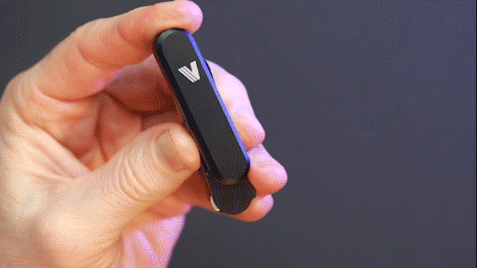 Person manipulating Keyport Versa58 Swiss Army Knife scales and modules.